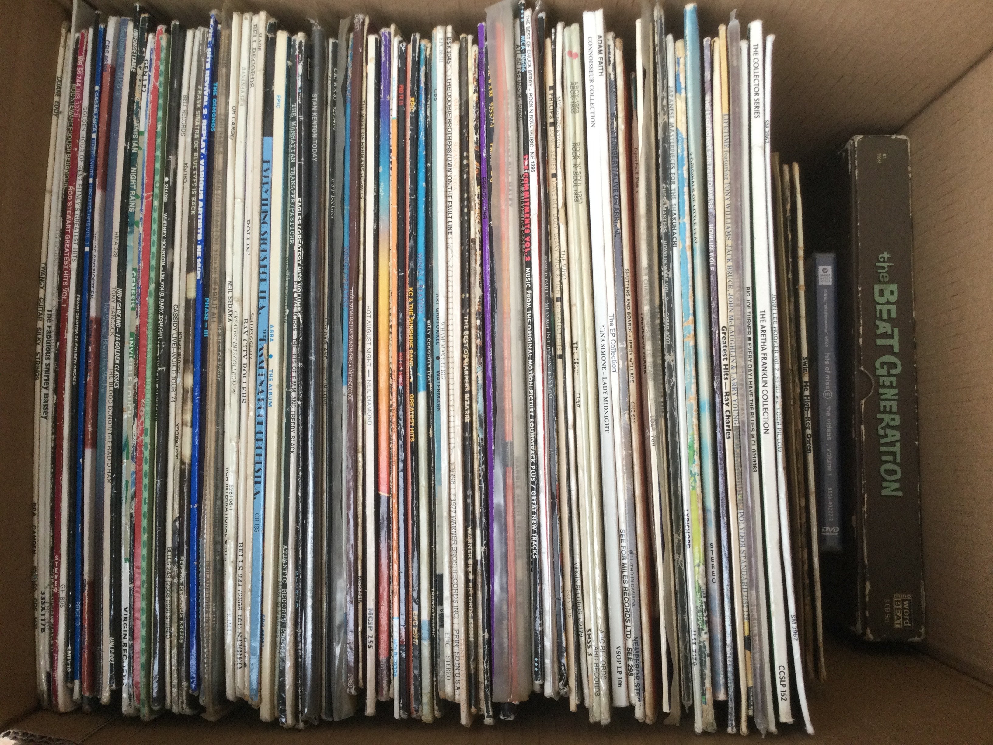 A box of LPs and 10" discs by various artists including Howlin Wolf, The Who, John Lee Hooker and others plus a Beat Generation CD box set.