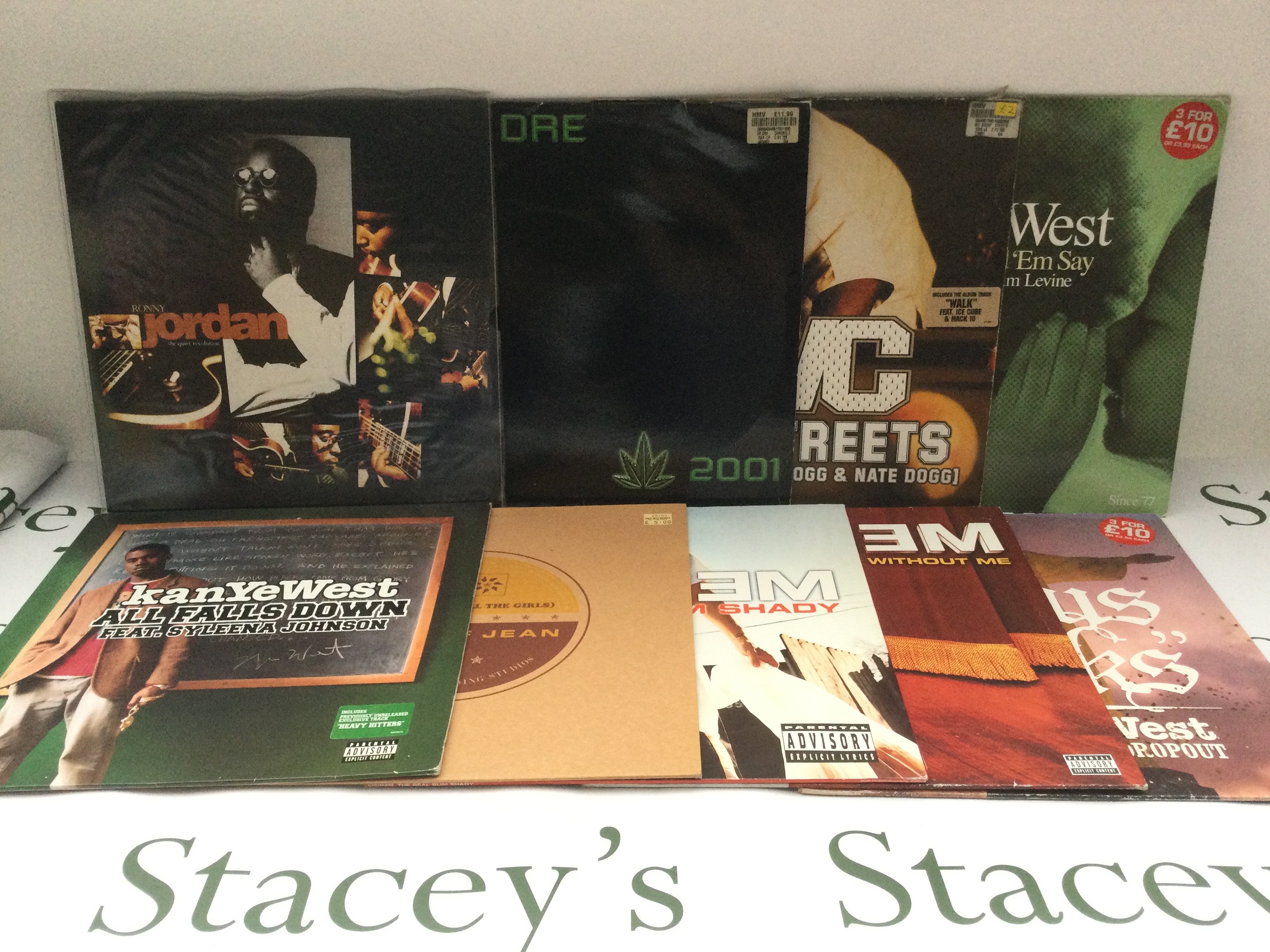 Nine hip hop LPs and 12" singles by various artists including Dr Dre, Eminem, Kanye West and others.