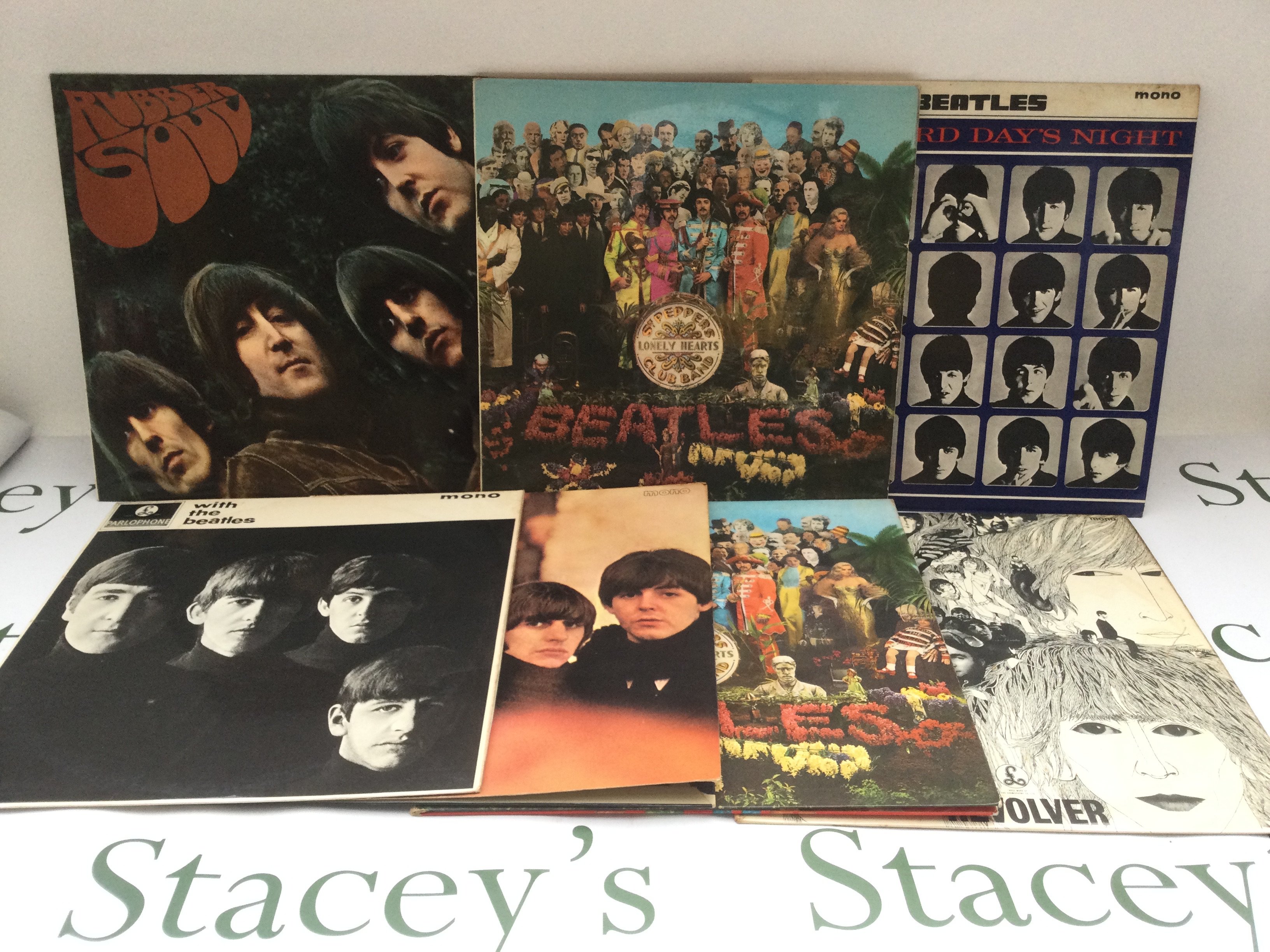 Seven early UK pressings of Beatles LPs comprising two copies of 'Sgt Pepper', a mono 'Revolver', 'Rubber Soul' and others.