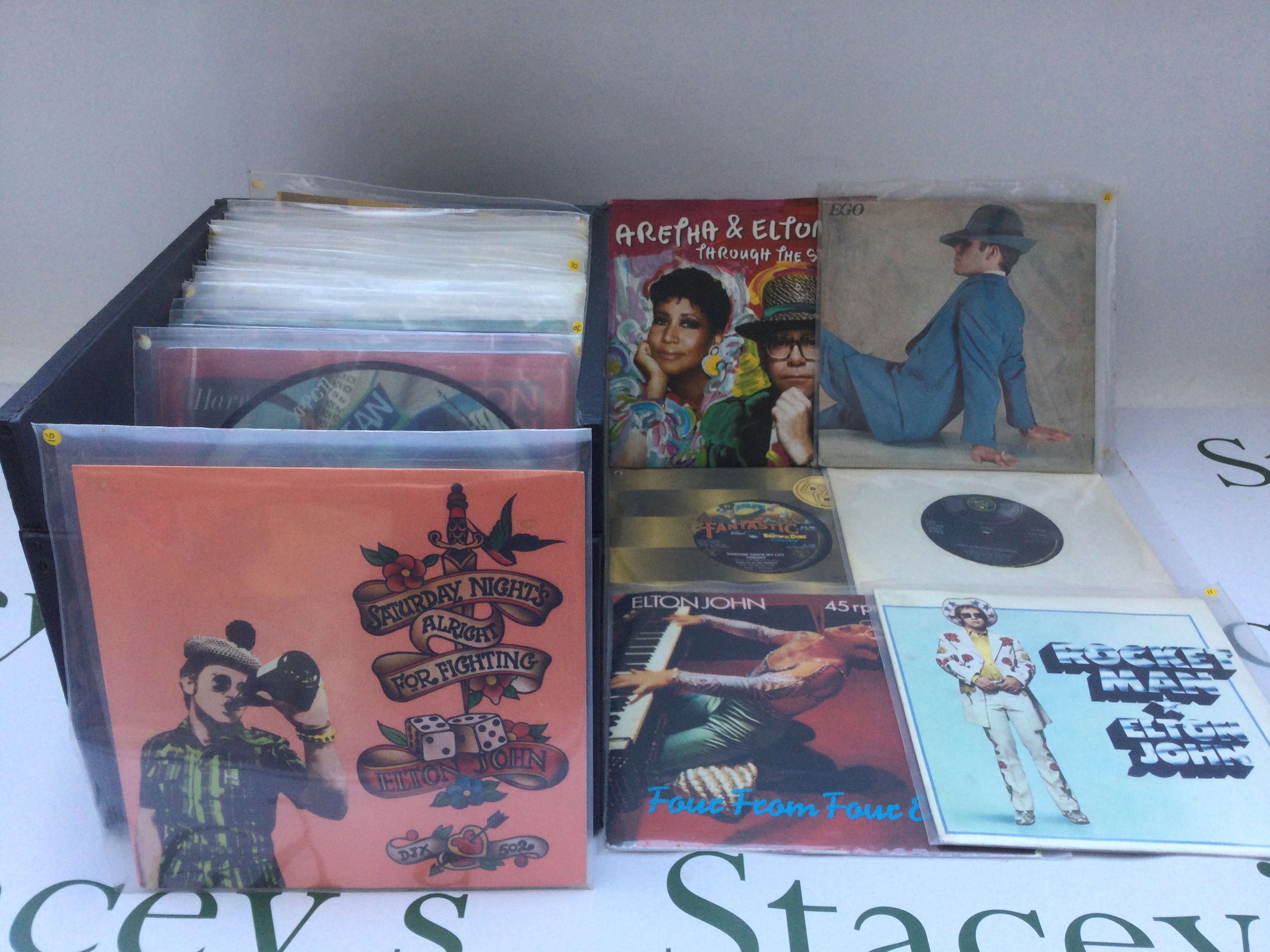 A record case of Elton John 7" singles and EPs.