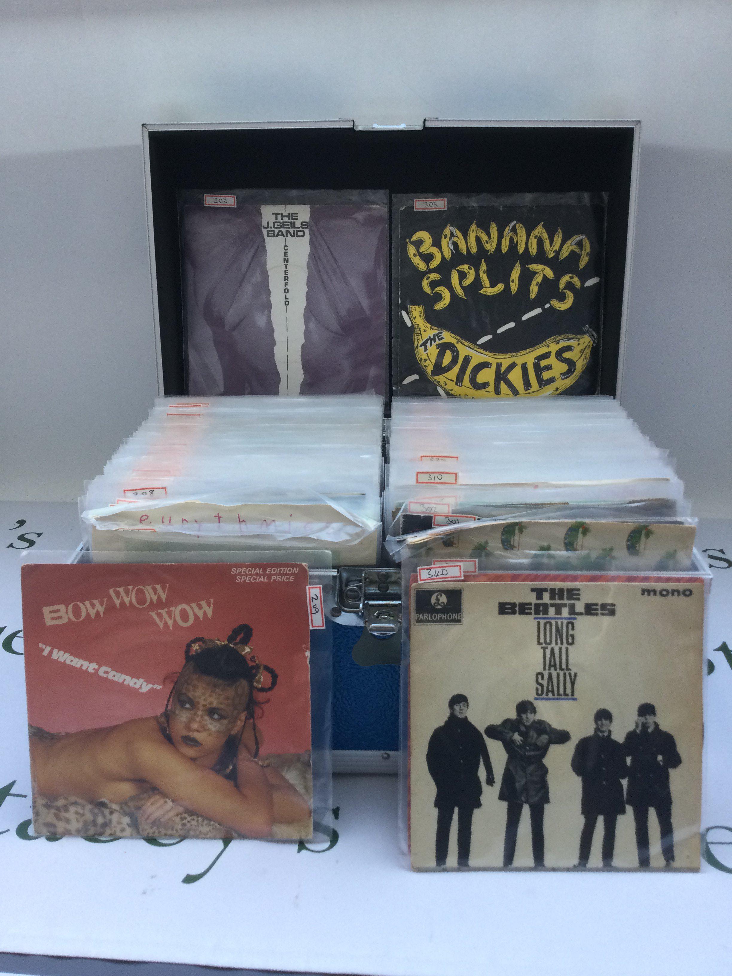 Seven Neo flight cases containing 7" singles and EPs by various artists from the 1960s onwards plus two empty flight cases for LPs (9).
