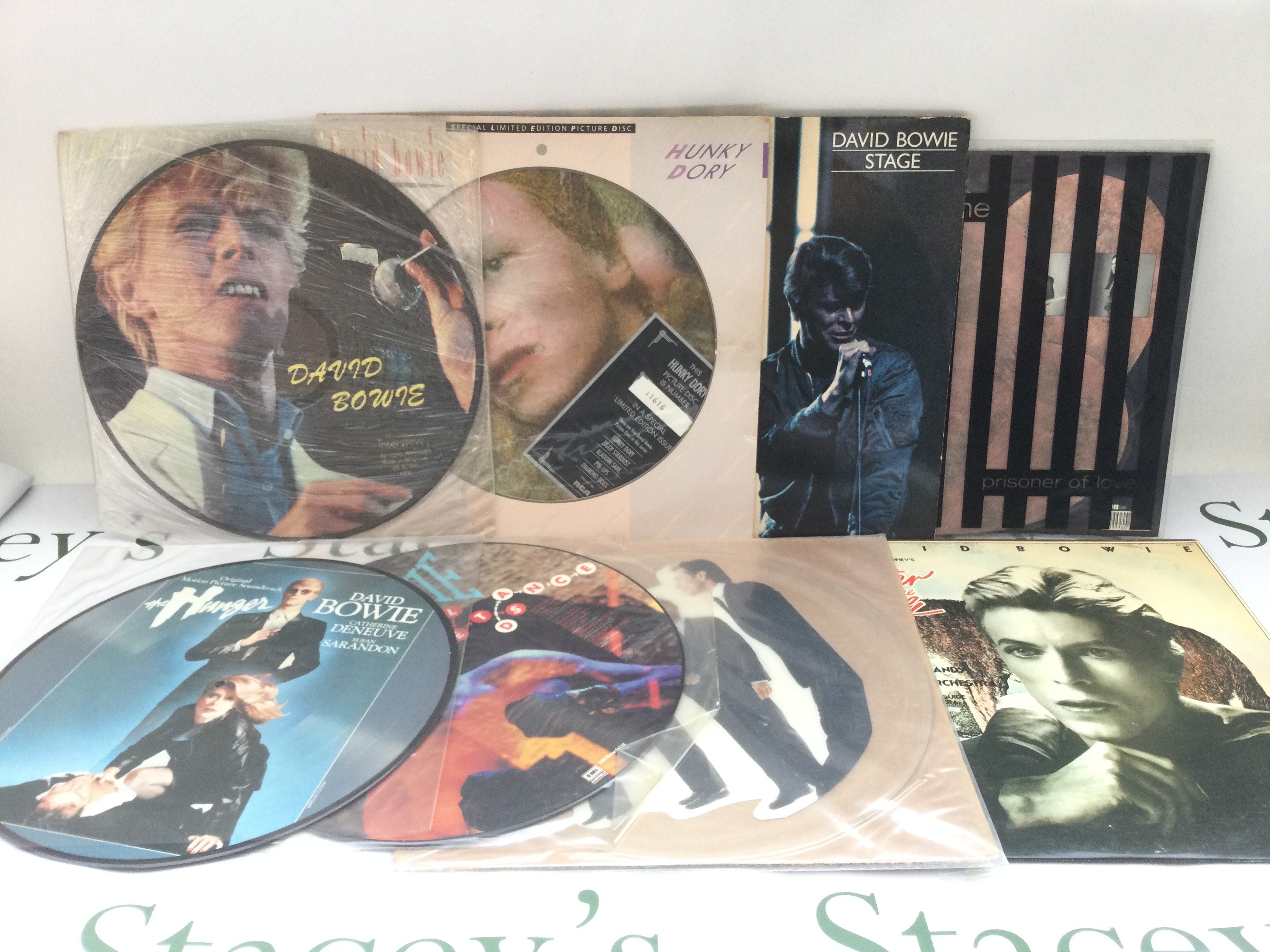 Eight David Bowie picure discs and coloured vinyl LPs and 12" singles including a blue vinyl 'Stage', a limited edition 'Hunky Dory' picture disc and others.