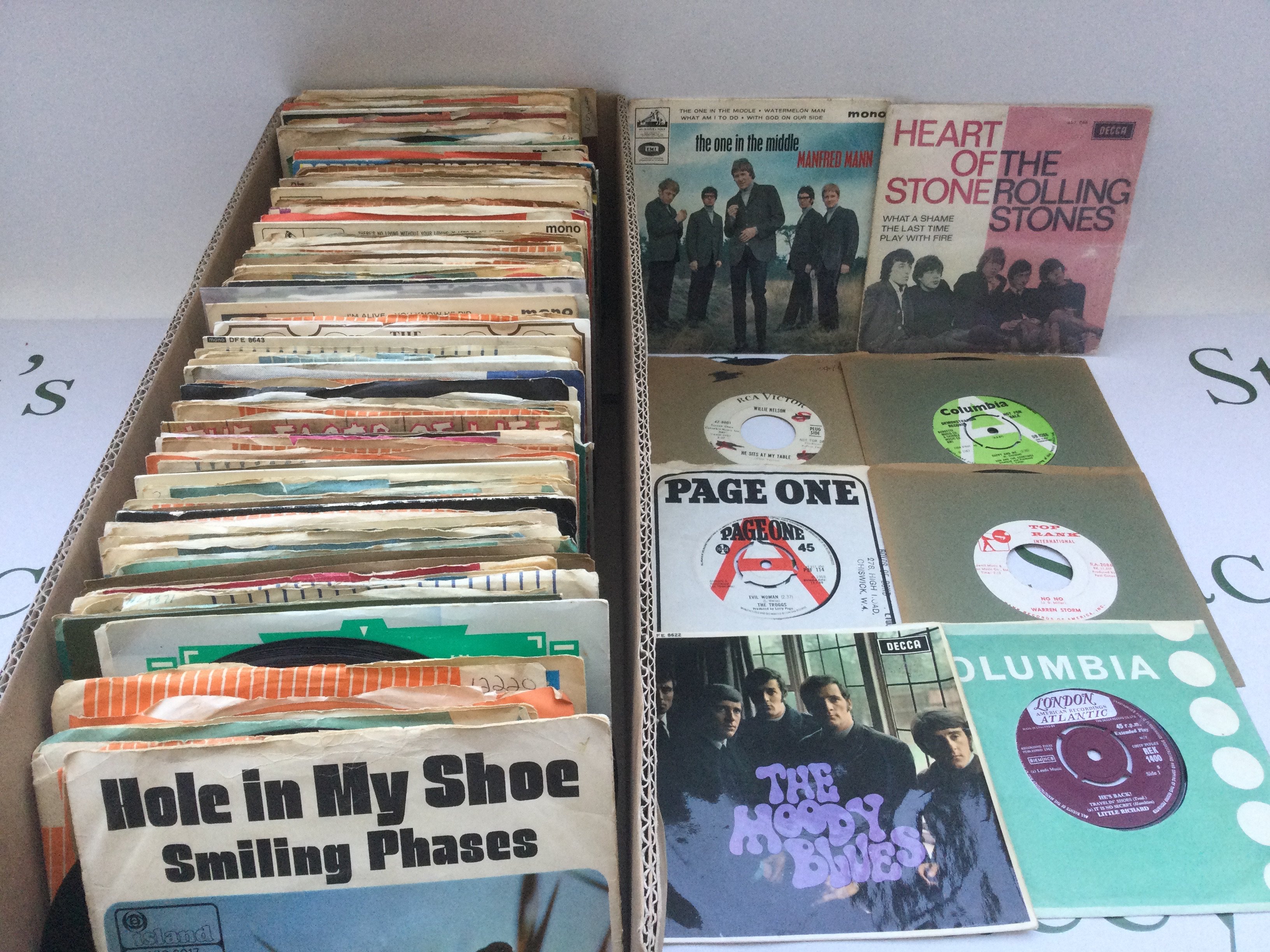 A box and two record cases of 1950s and 60s US and UK 7" singles and EPs by various artists including some promo discs.