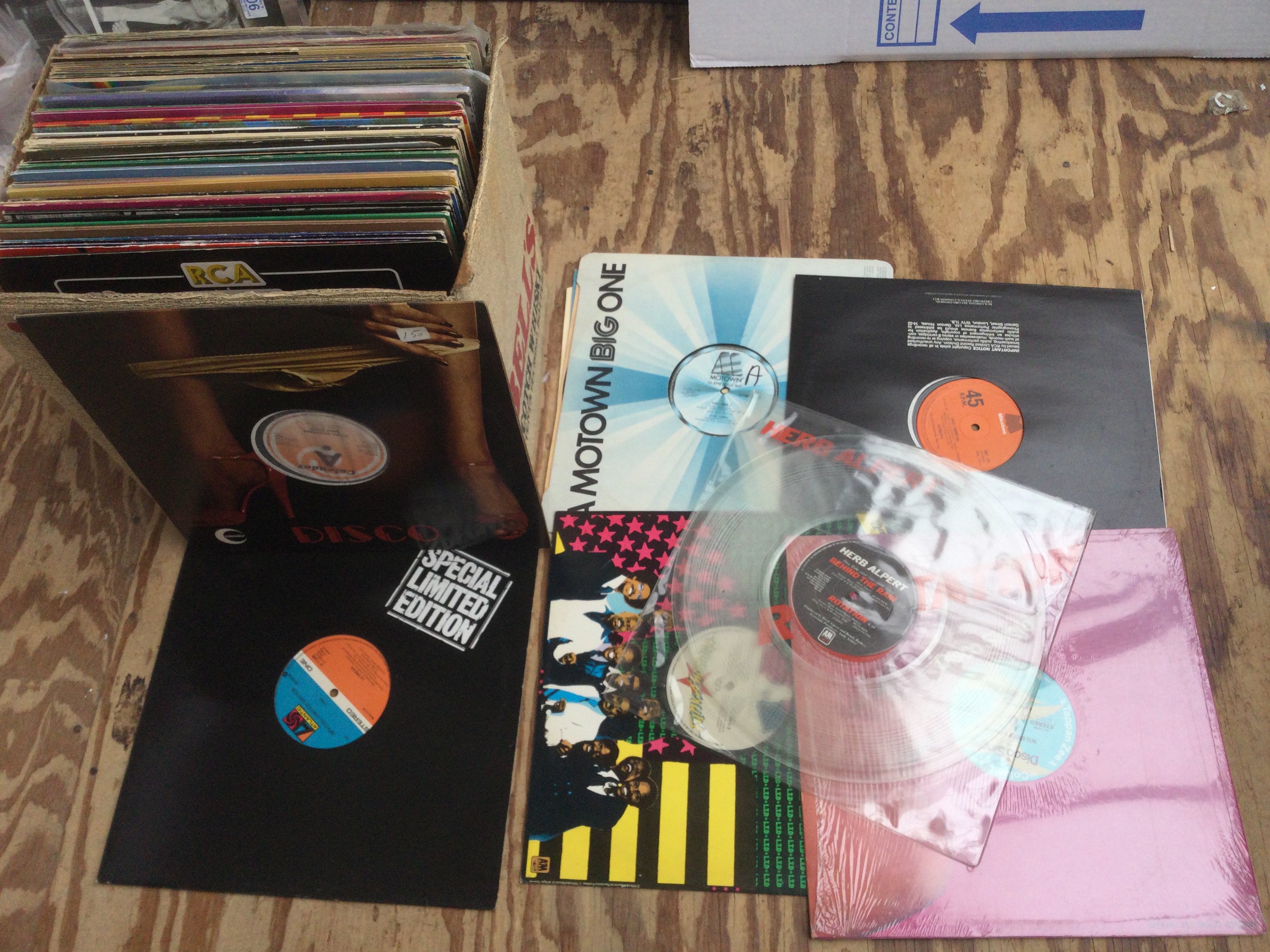 A box of mainly disco 12" singles.