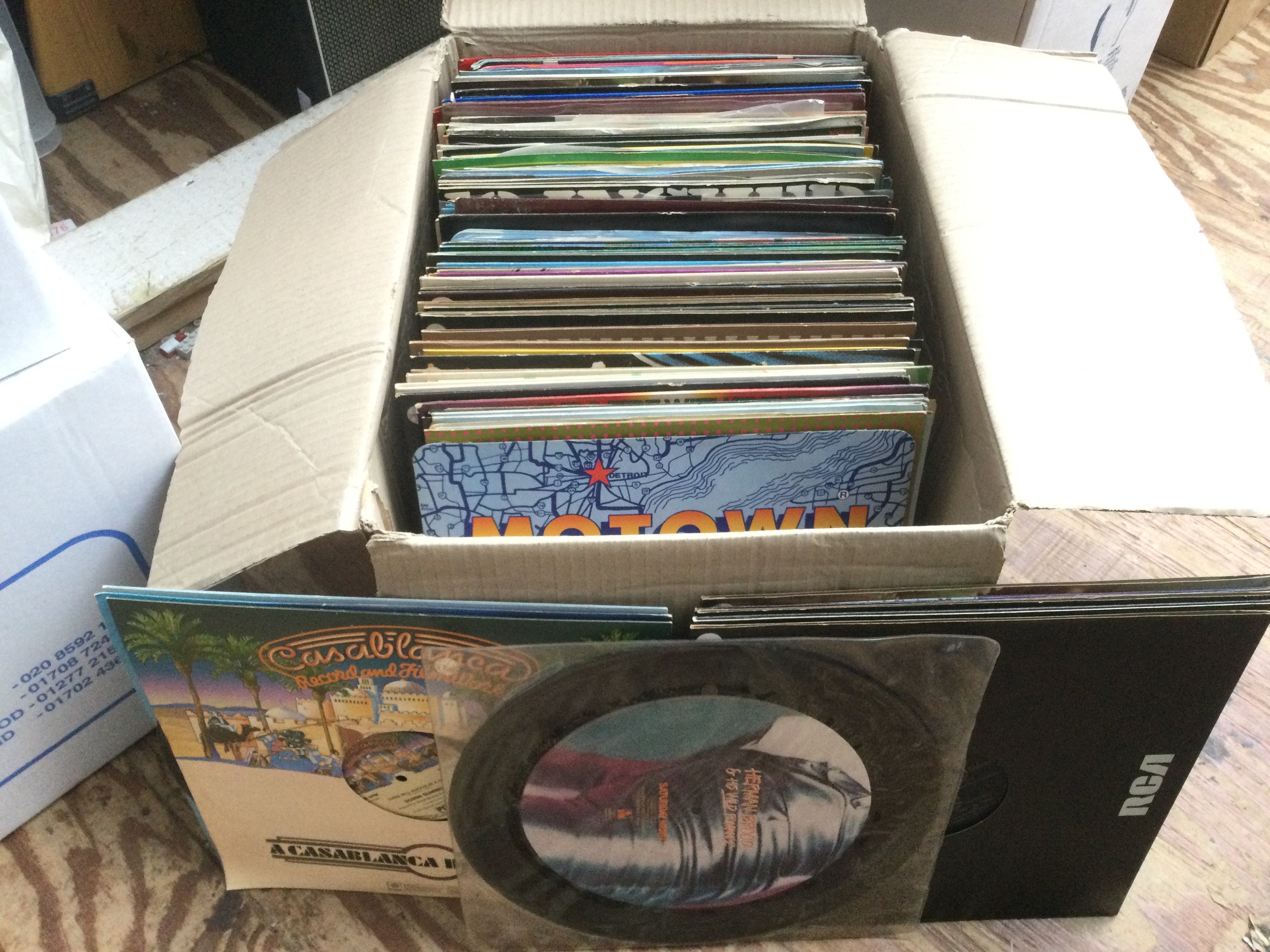A box of mainly disco and soul 12" singles by various artists including promotional discs. Please note some covers are water damaged.