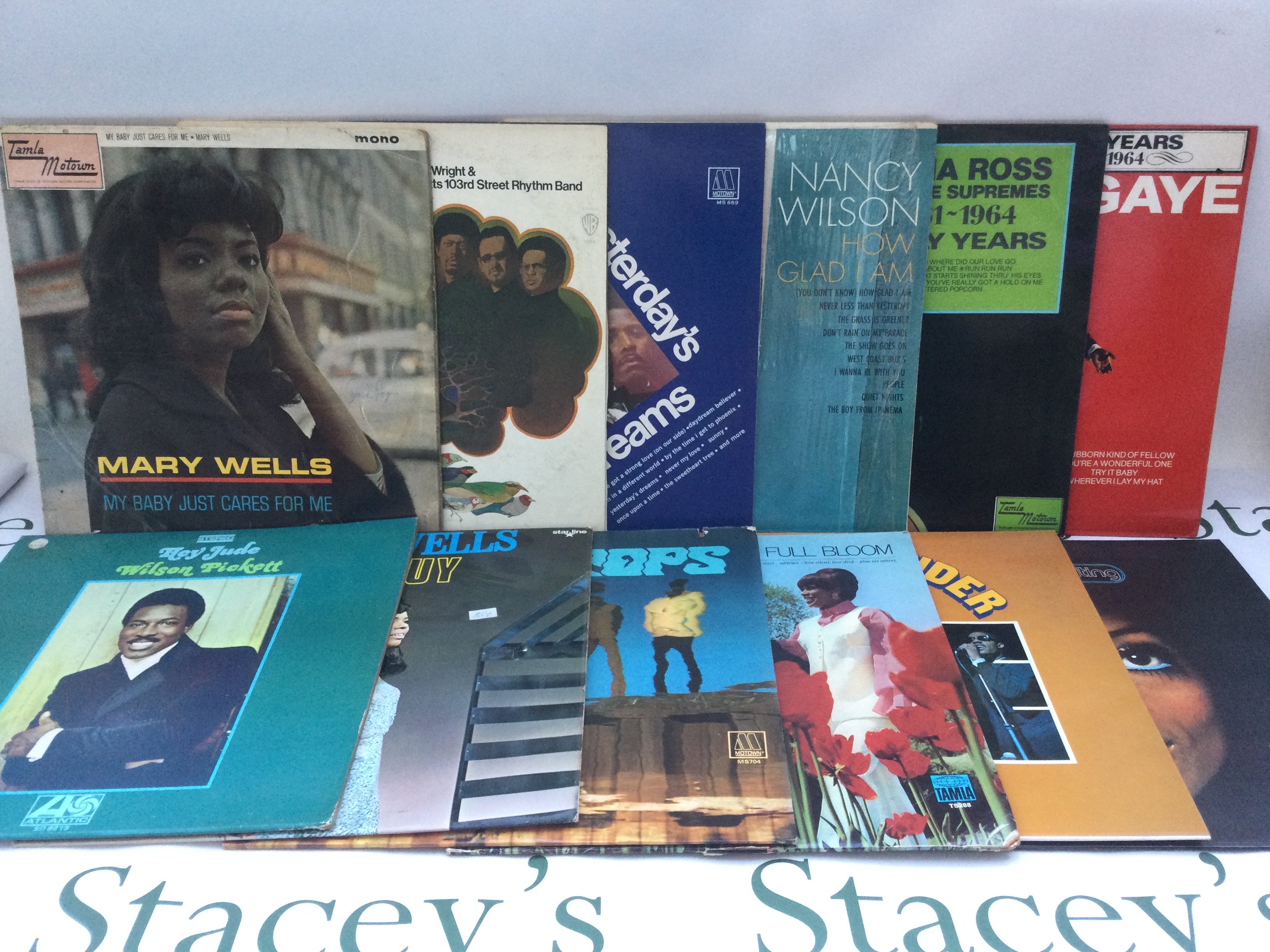 Two bags containing 24 soul and Motown LPs by various artists including Diana Ross, Wilson Pickett, Mary Wells, Four Tops and others. Includes some US pressings.