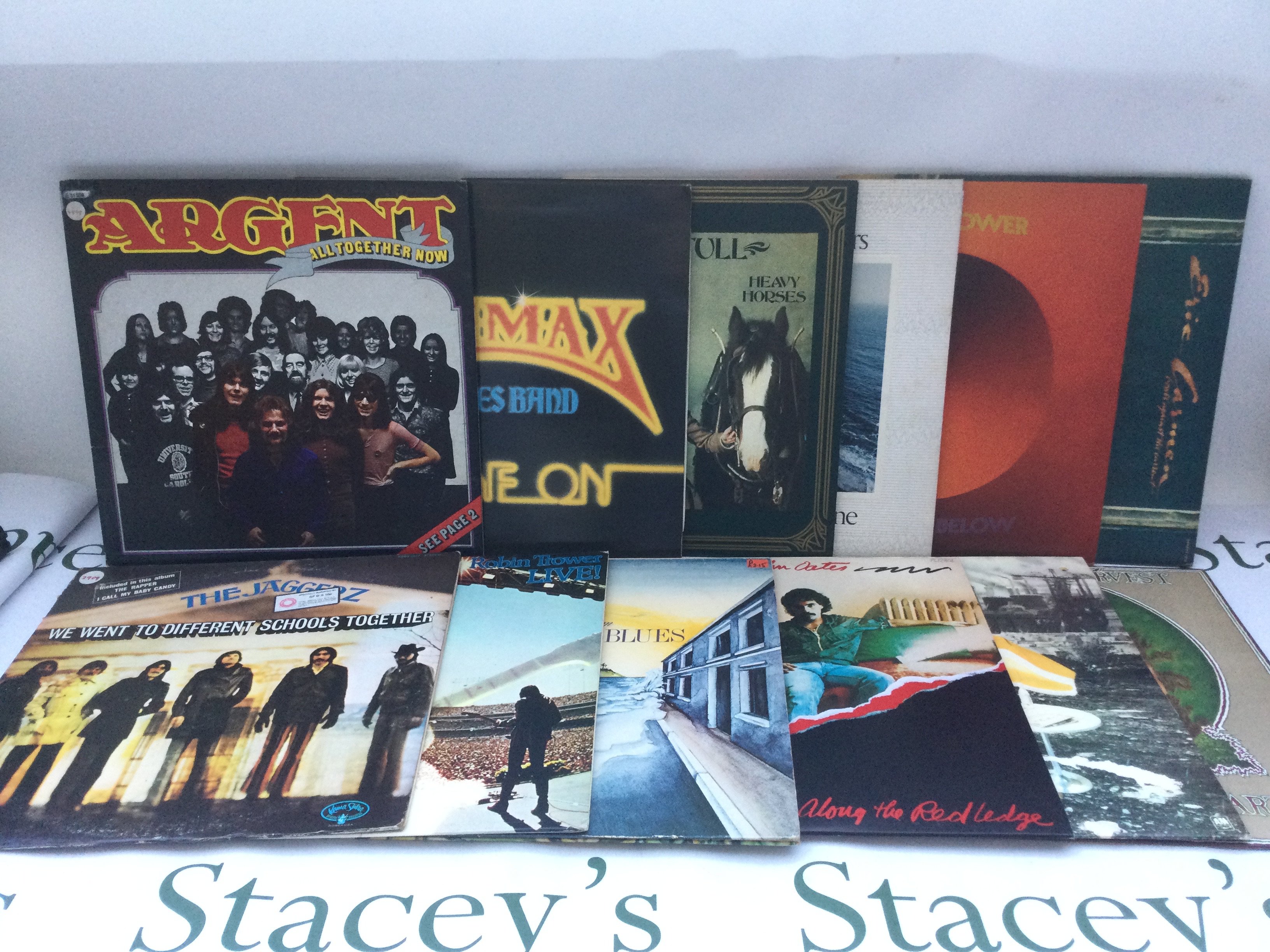 Two bags containing a collection of 23 rock LPs by various artists including Atomic Rooster, Little Feat, Grand Funk and others. Includes two promo copies.