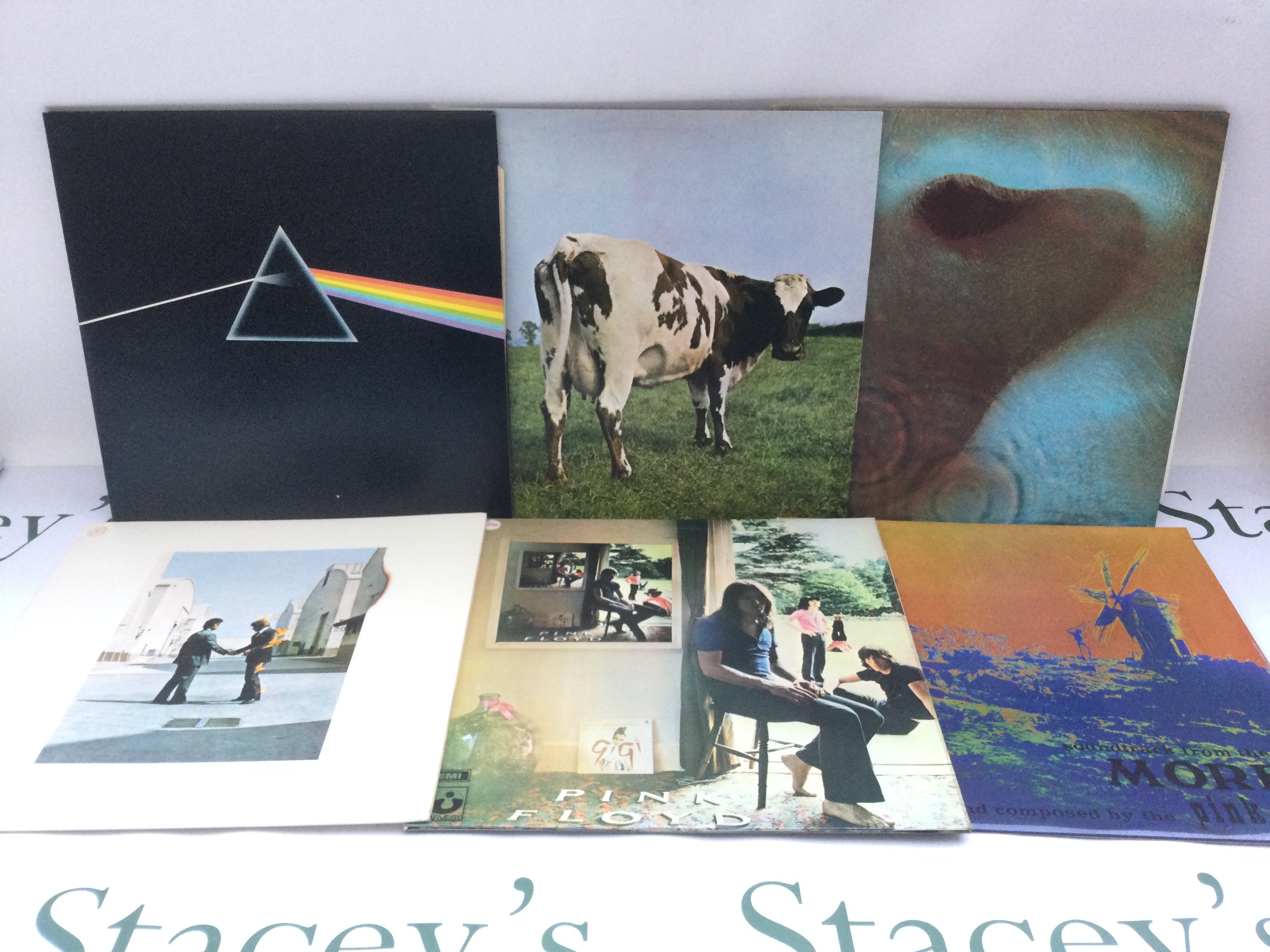 Six Pink Floyd LPs comprising 'Dark Side Of The Monn' complete with all inserts, 'Atom Heart Mother', a DJ promo copy of 'Ummagumma' and others.