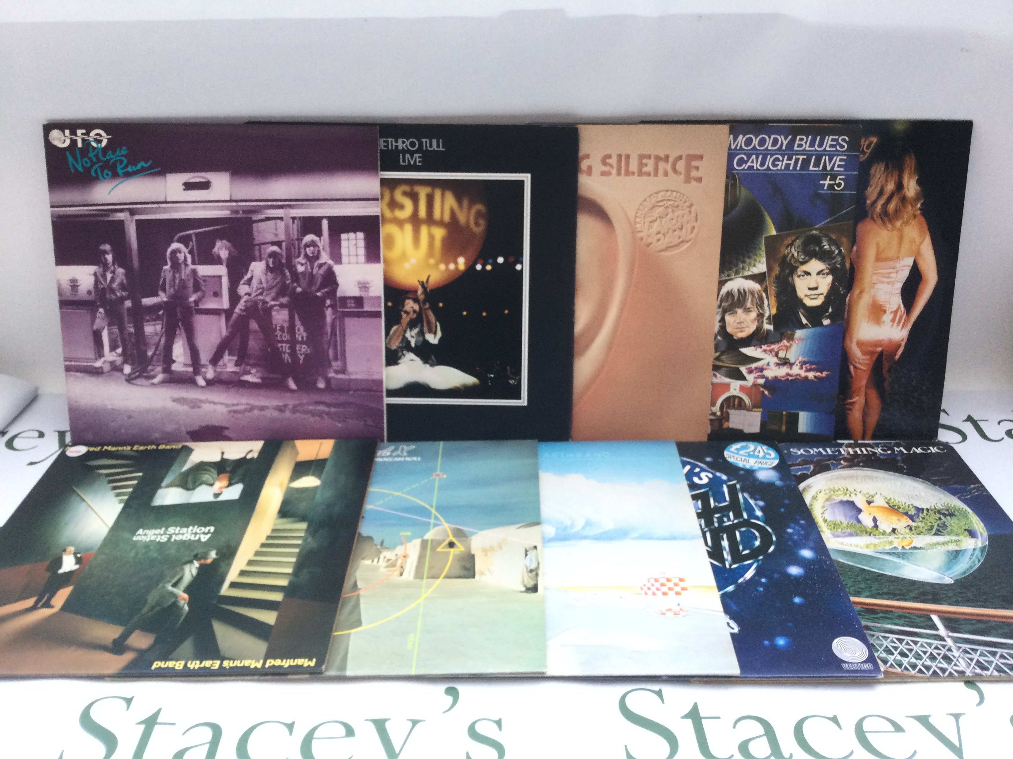 Ten rock and prog rock LPs by various artists including UFO, Manfred Mann's Earth Band, Brand X and others. Includes a promo copy of 'Angel Station'.