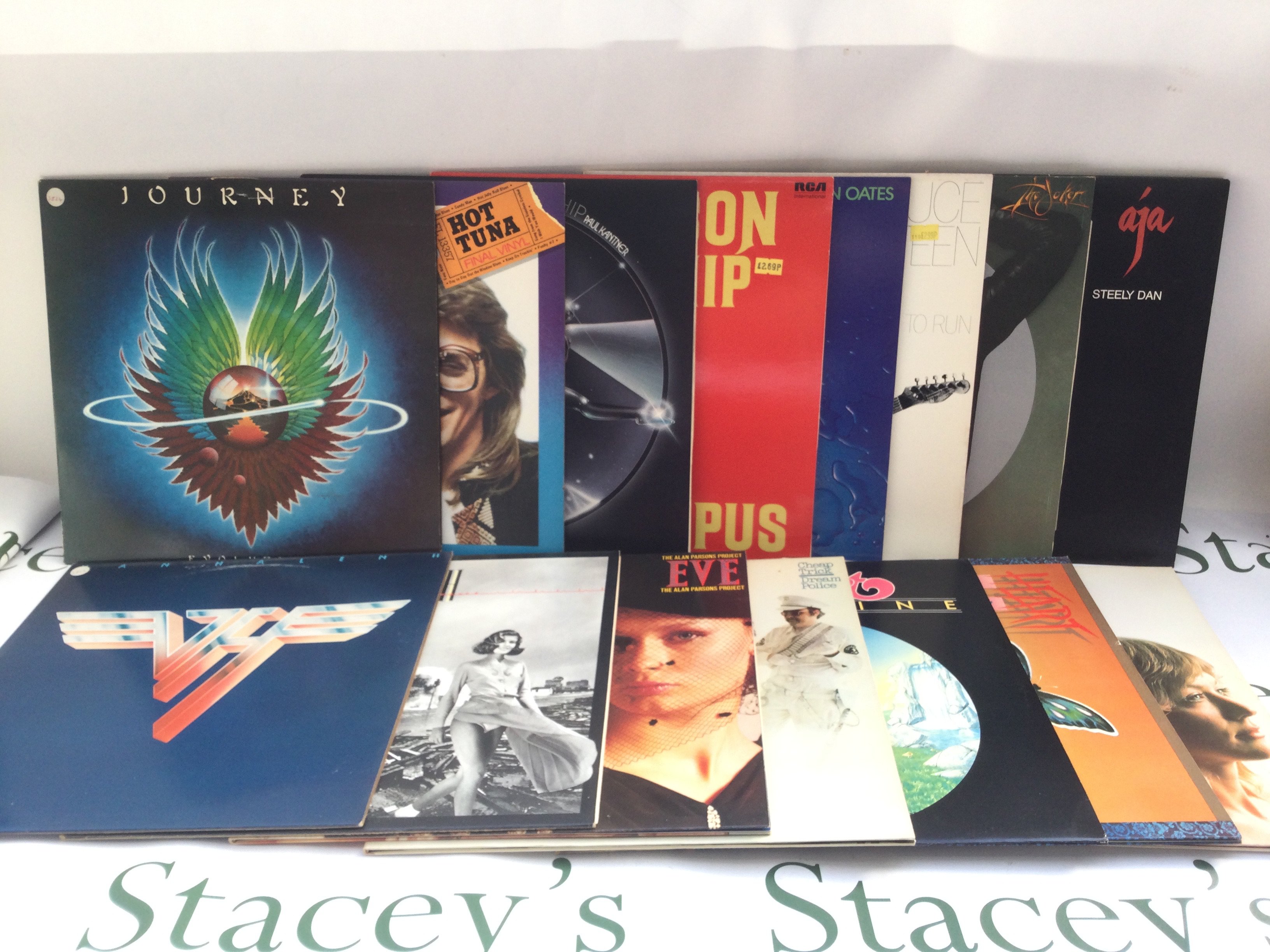 Fifteen rock LPs by various artists including Steely Dan, Van Halen, Cheap Trick, Jefferson Starship and others. Includes four promo LPs.