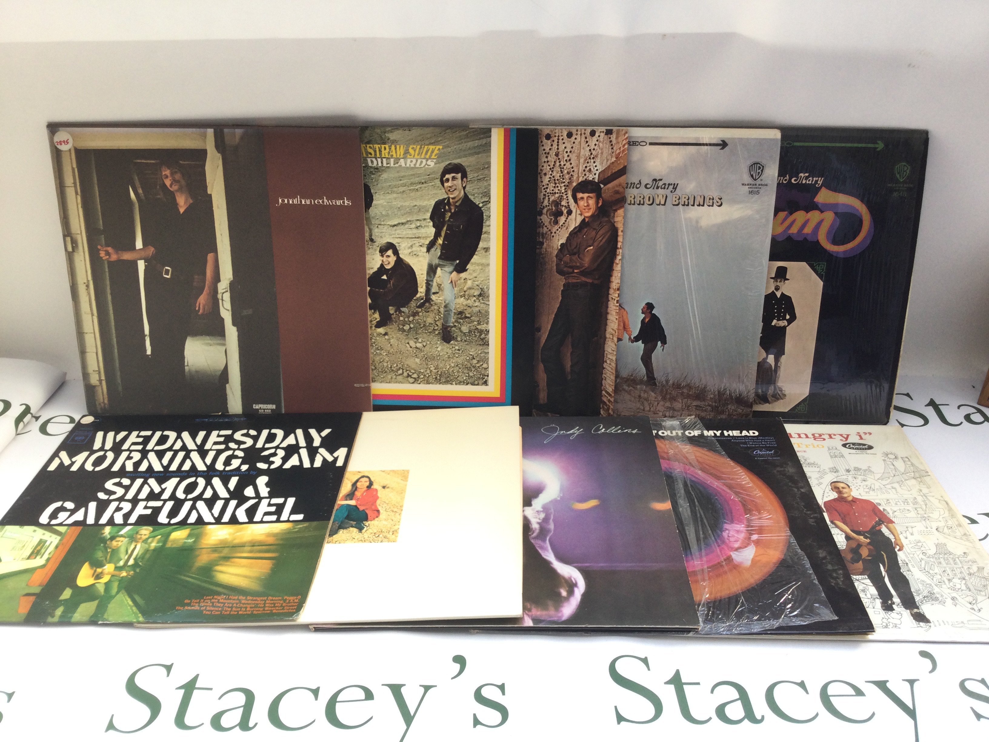 Two bags containing 20 folk and country LPs by various artists including Judy Collins, The Dillards, Peter, Paul & Mary and others. Includes various US pressings.