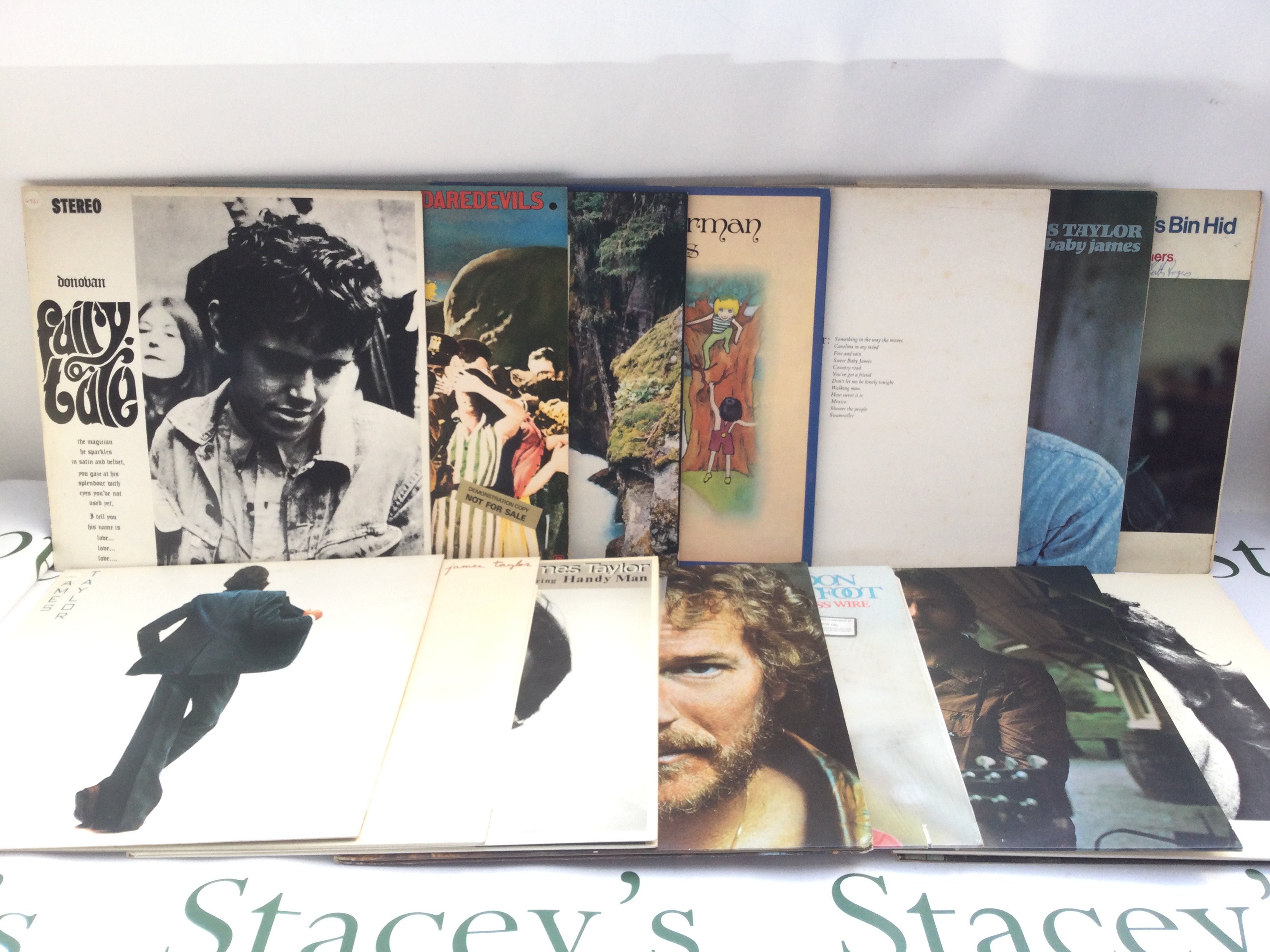 Fourteen folk LPs by various artists including Donovan, James Taylor, Gordon Lightfoot and others. Includes a promo 'JT' LP.