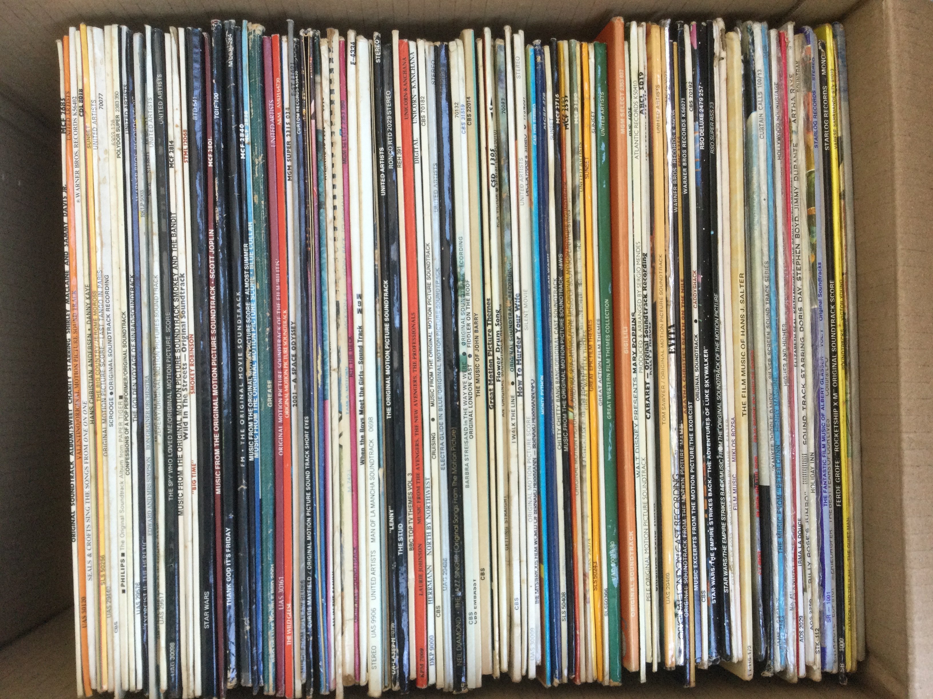 Two boxes of film, TV and theatre show soundtracks.