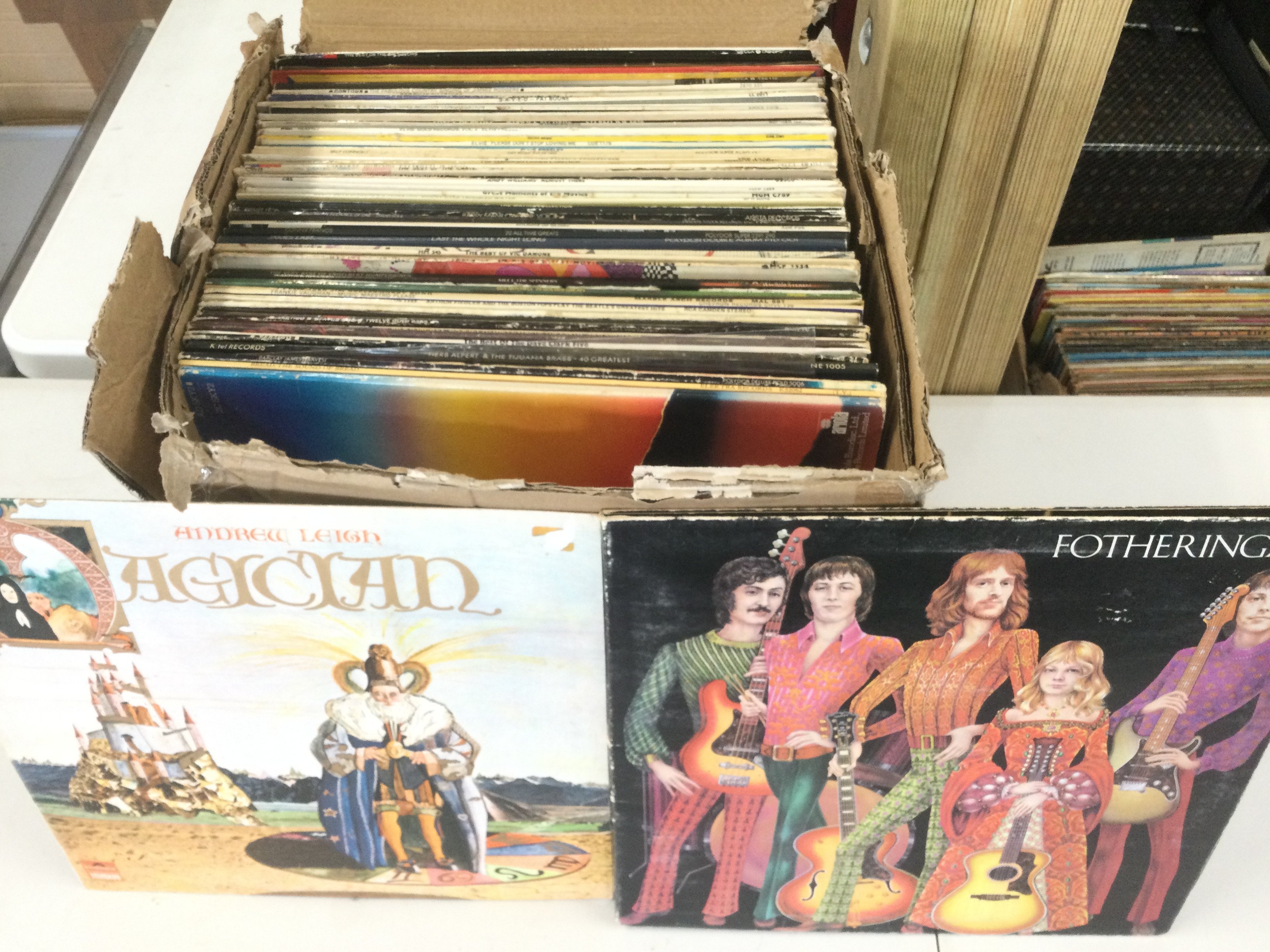 A box of LPs by various artists including Fotheringay, Elvis Presley and others.