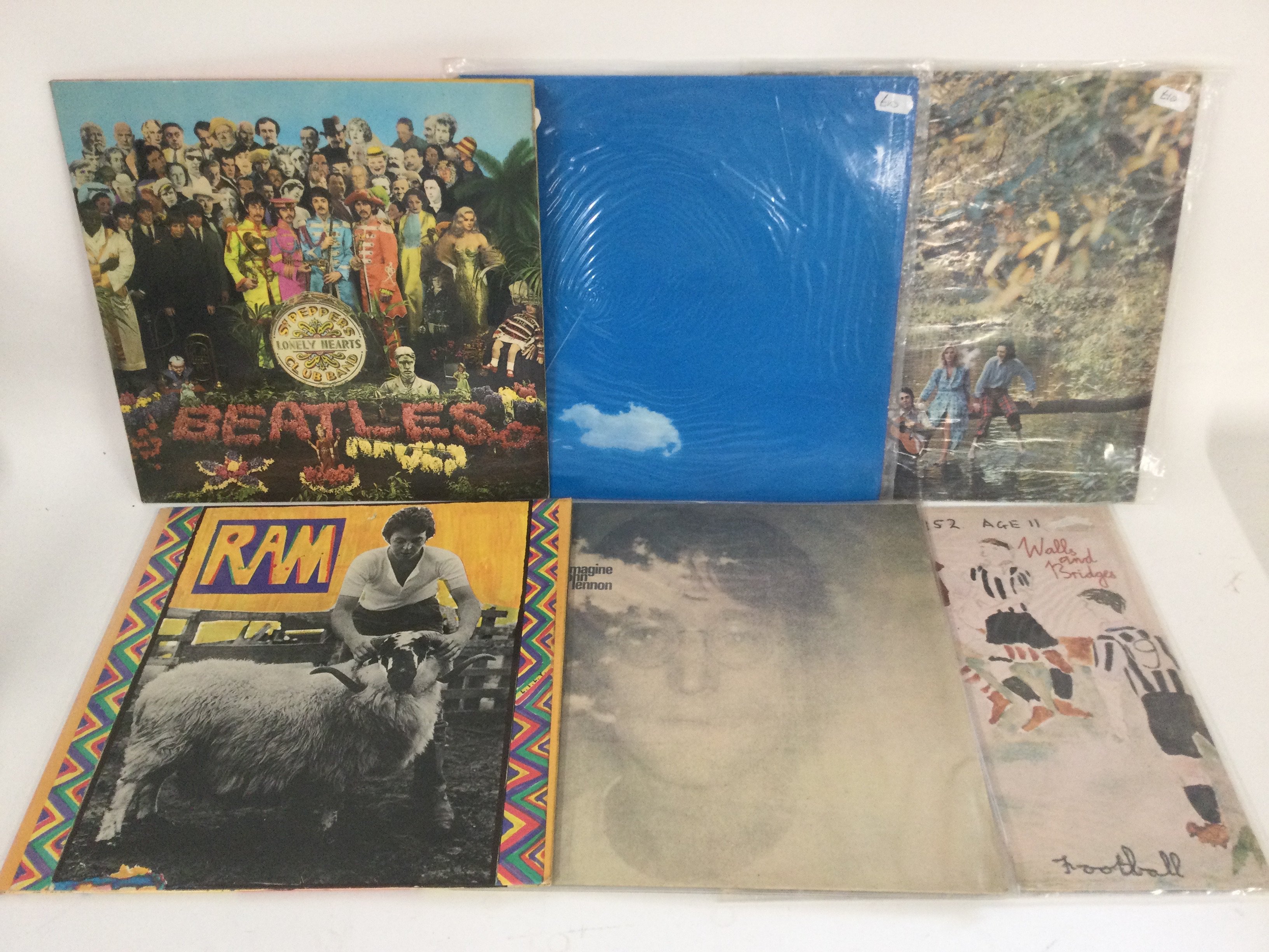 Twelve Beatles and solo LPs including 'Ram', 'Walls & Bridges', 'Venus & Mars' and others.