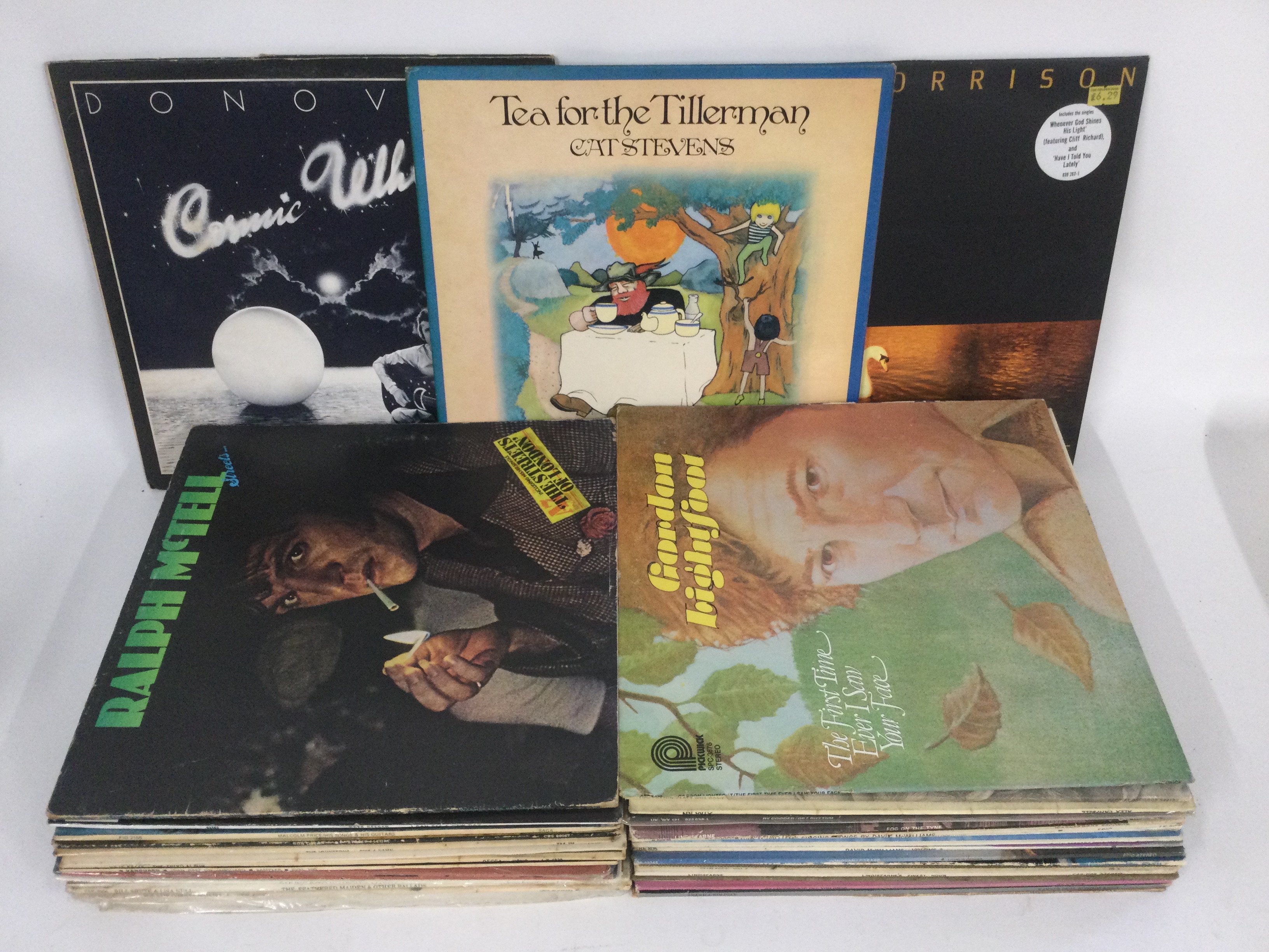 A record case of folk rock LPs by various artists including Donovan. Cat Stevens, Tom Paxton and others,