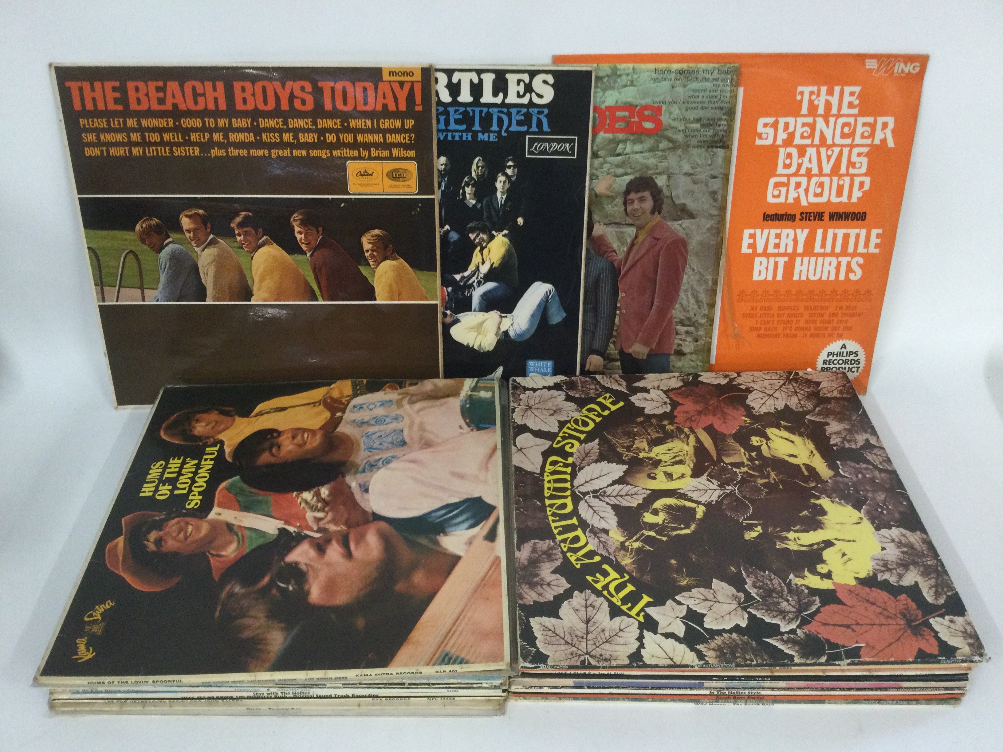 A record case of 1960s rock and pop LPs by various artists including The Beach Boys, The Turtles, The Spencer Davis Group and others.