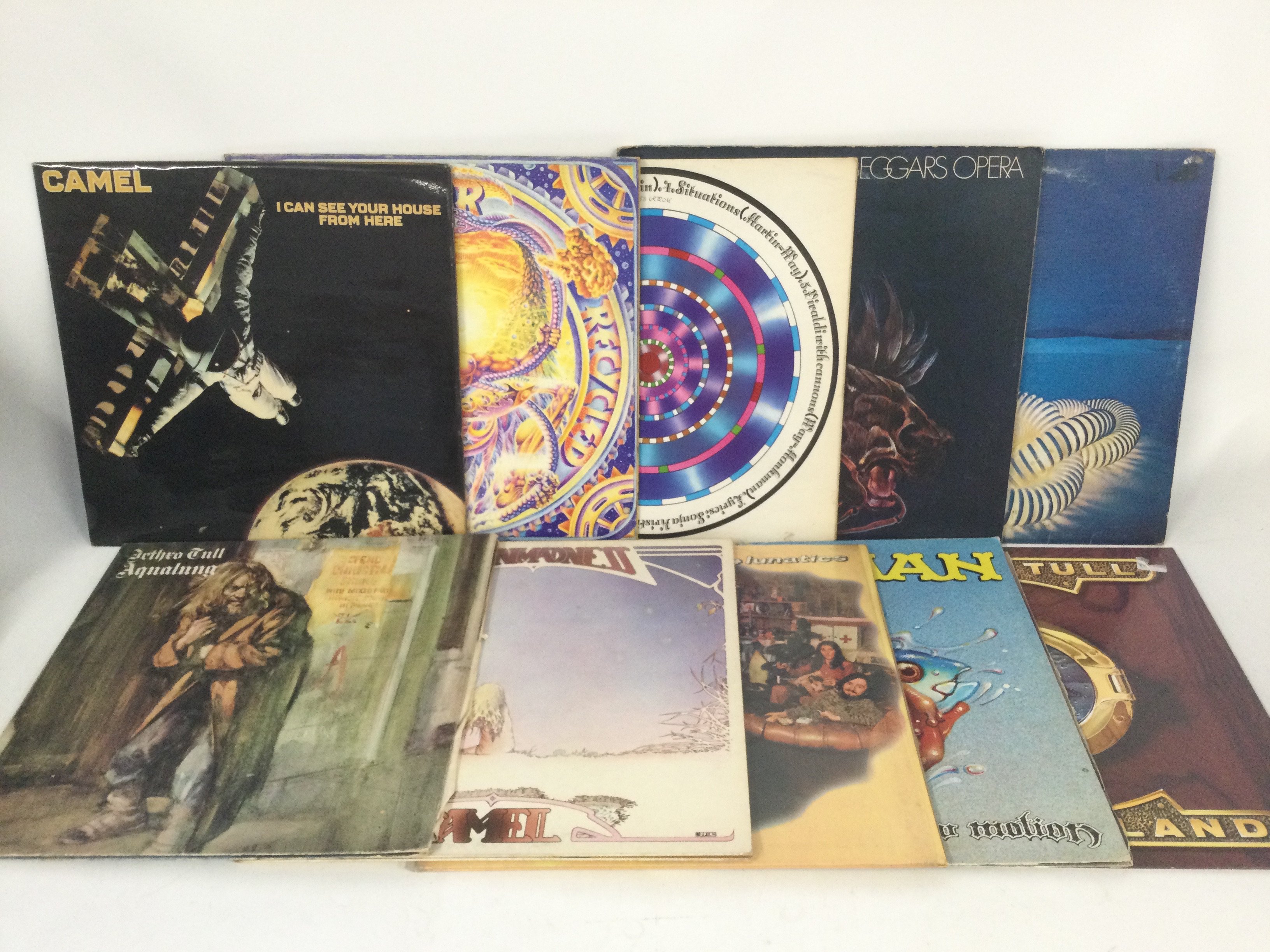 Two bags containing 20 prog rock LPs by various artists including Camel, Nektar, Man, Curved Air and others.