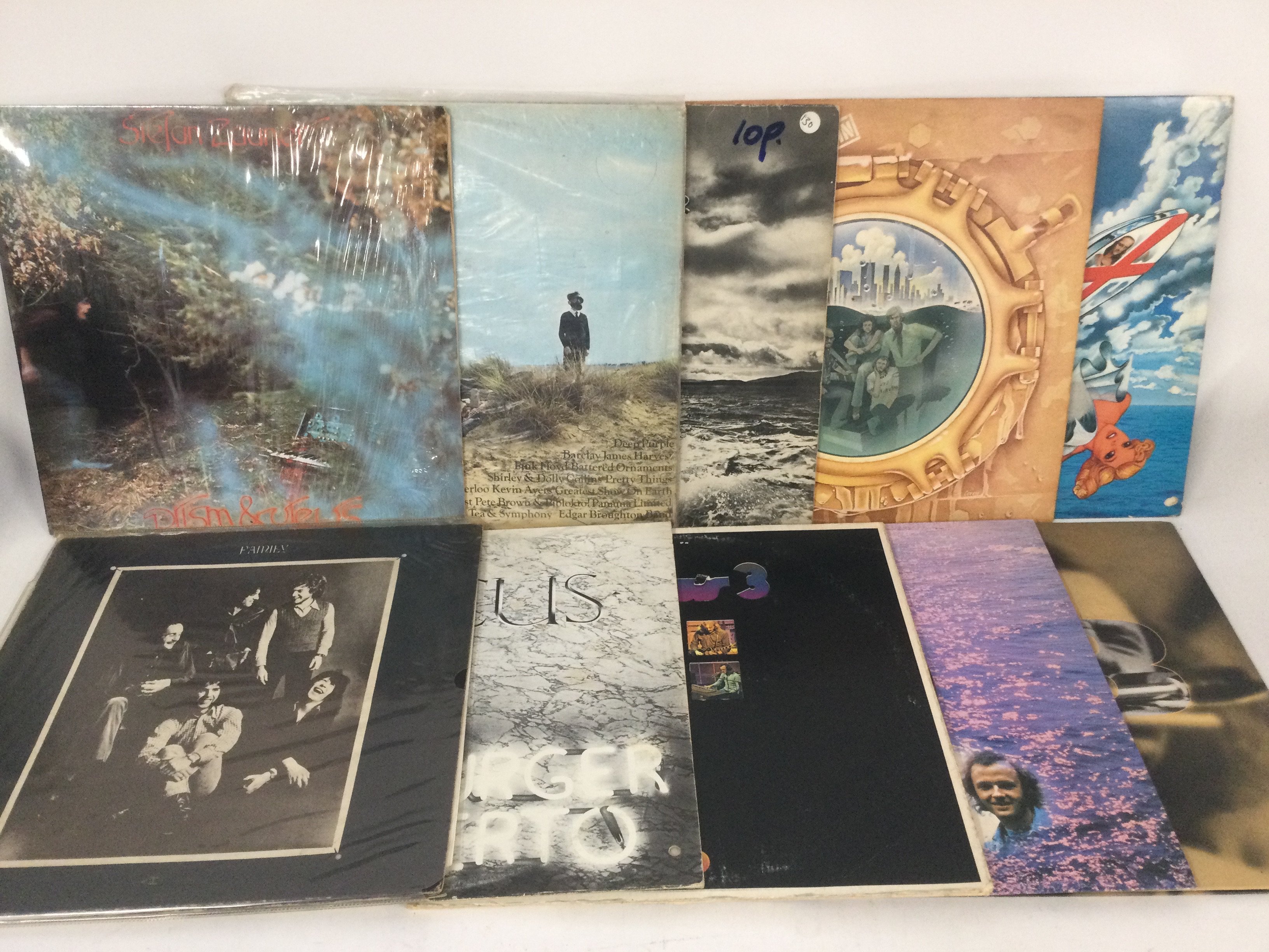 Two bag containing 20 prog rock LPs by various artists including Family, Focus, ELP and others.