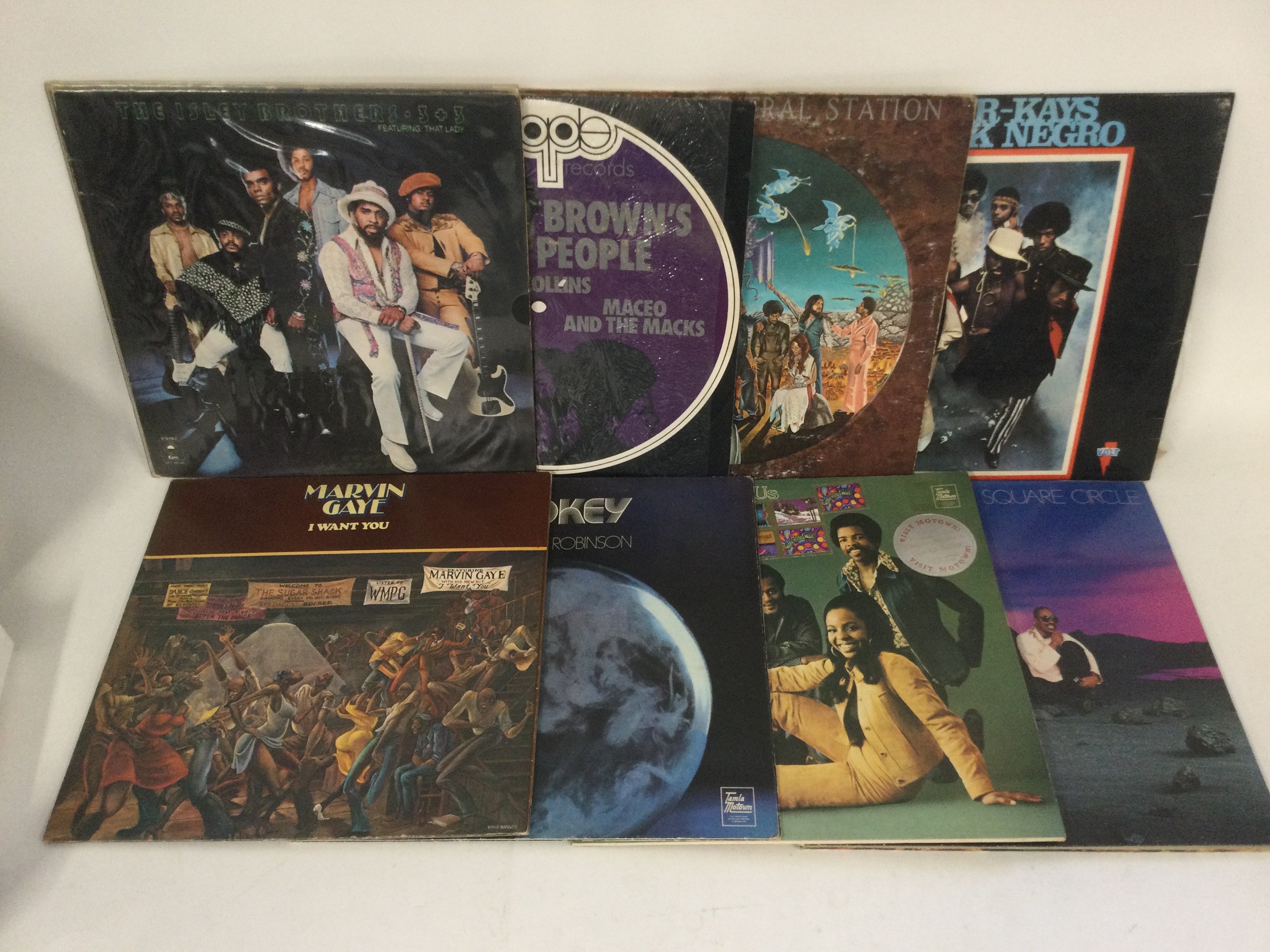 Two bags containing 27 funk and soul LPs and 12" singles by various artists including Marvin Gaye, The Isley Brothers, Smokey Robinson and others.