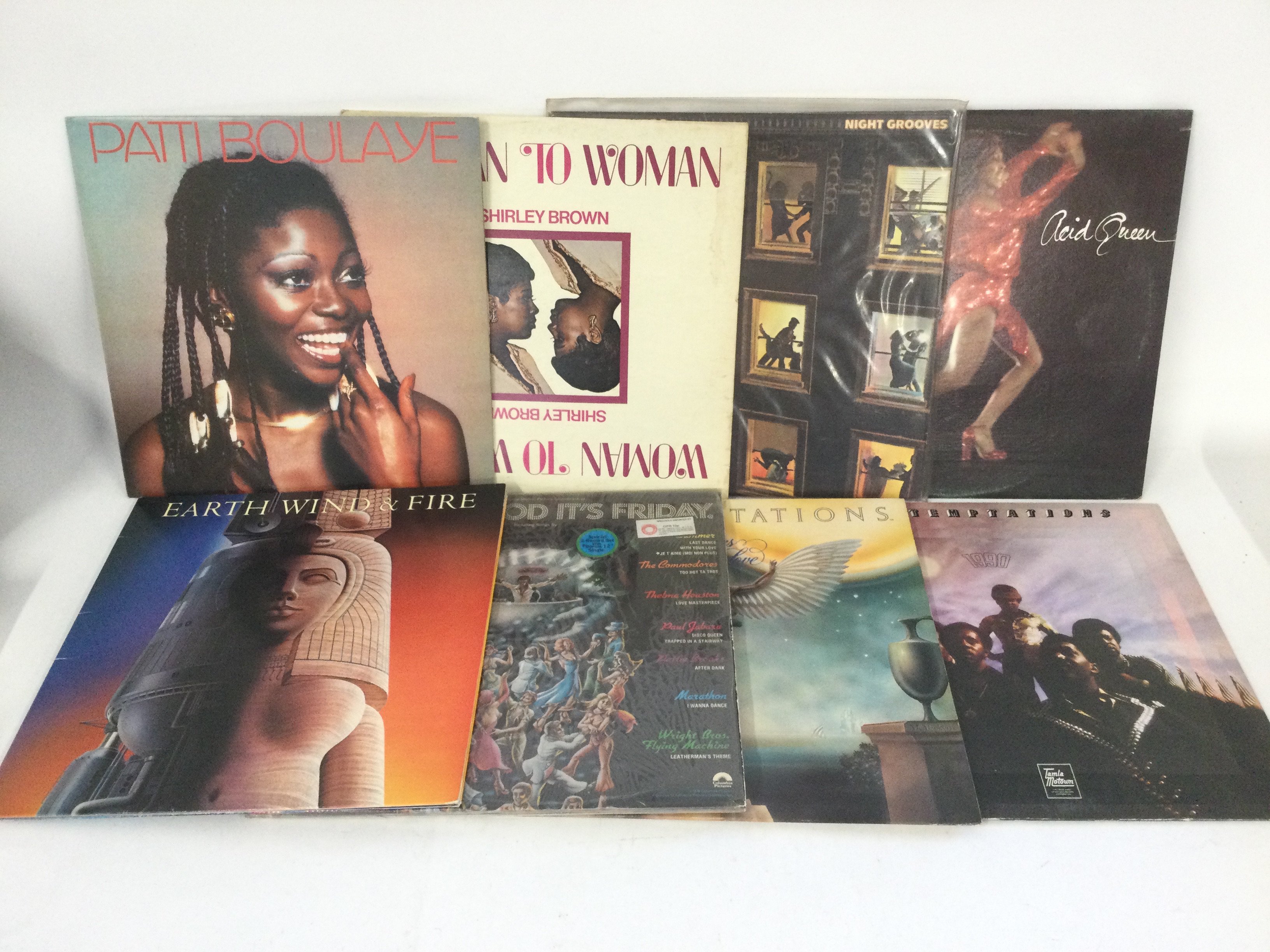 Two bags containing 27 funk and soul LPs by various artists including The Temptations, Earth, Wind & Fire, Tina Turner and others.