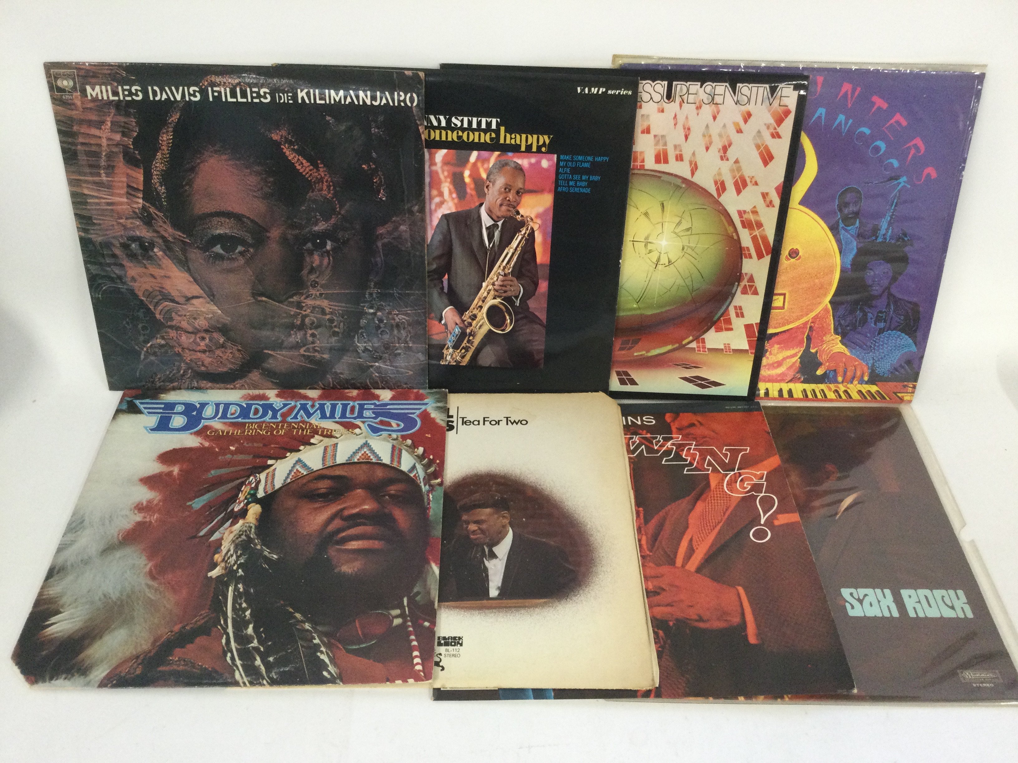 Two bags containing 25 jazz LPs by various artists including Miles Davis, Herbie Hancock, Coleman Hawkins and others.