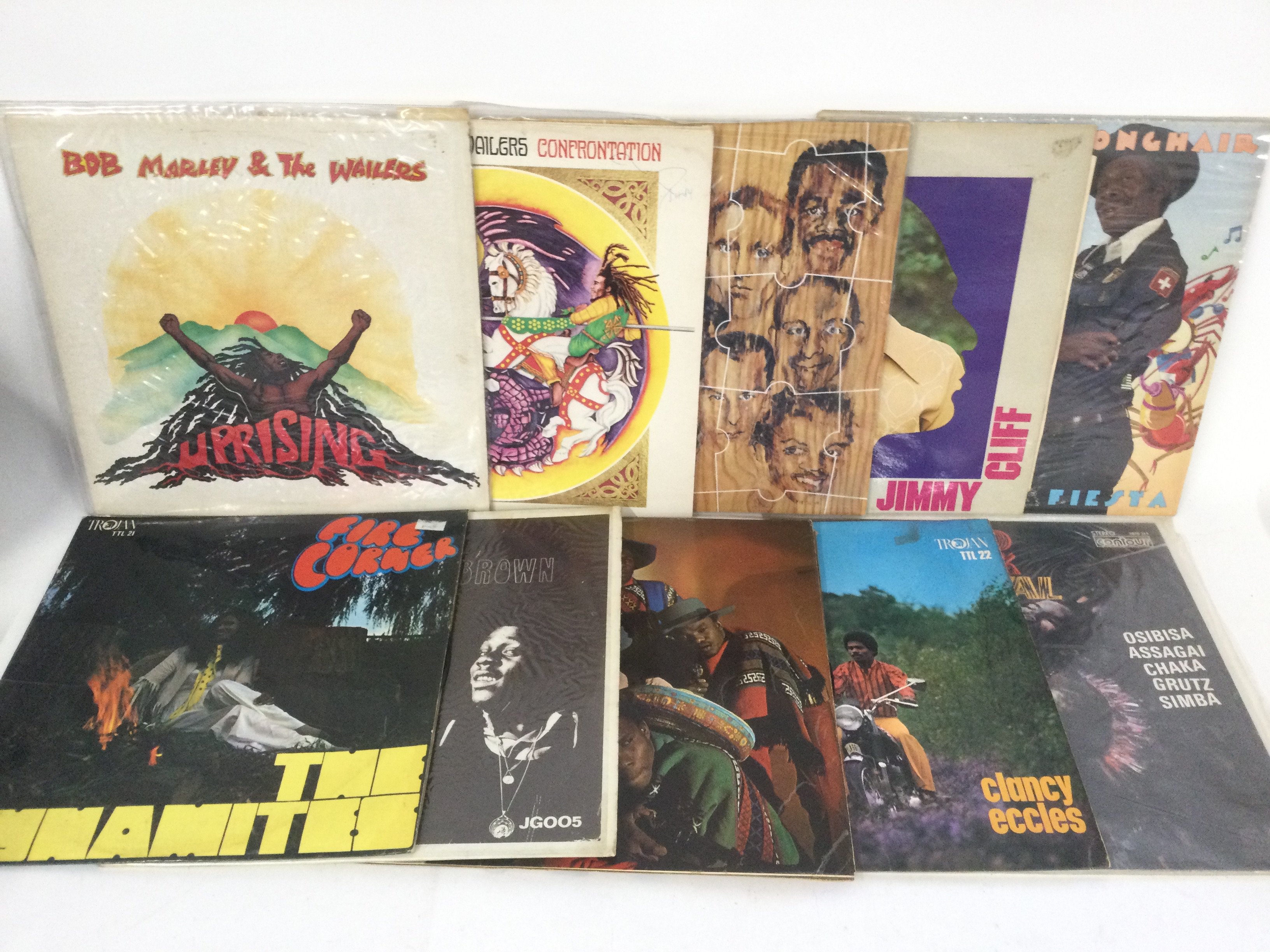 20 reggae and ska LPs and 12" singles by various artists including Bob Marley, Dennis Brown, Professor Longhair and others.