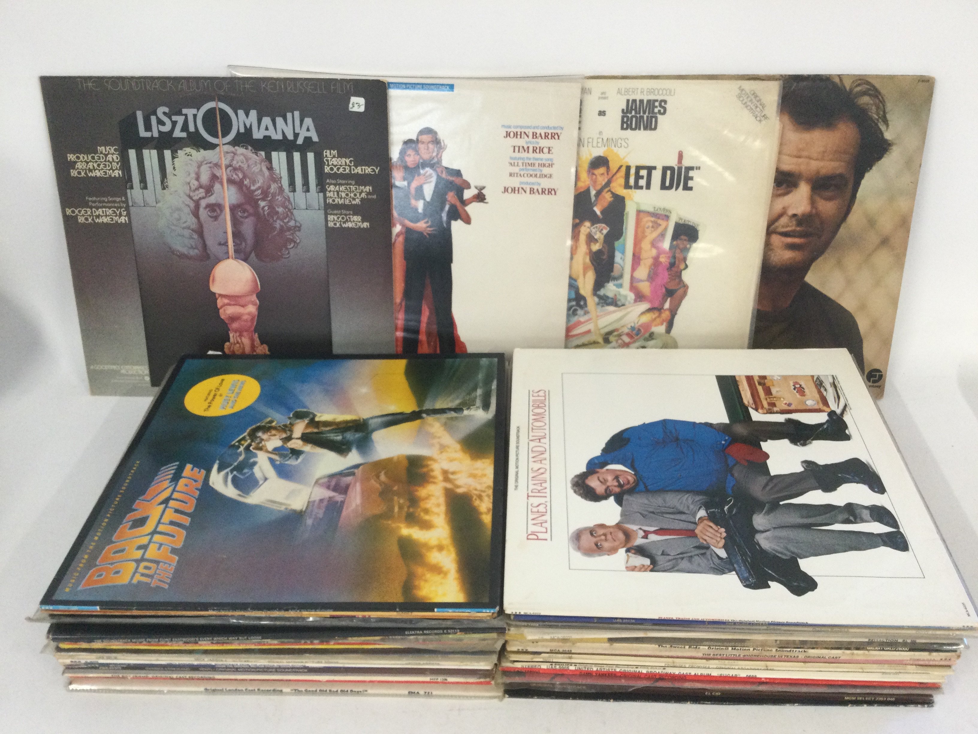 A record case of film and theatre soundtrack LPs including 'One Flew Over The Cuckoo's Nest', 'Live And Let Die', 'Back To The Future' and many more,