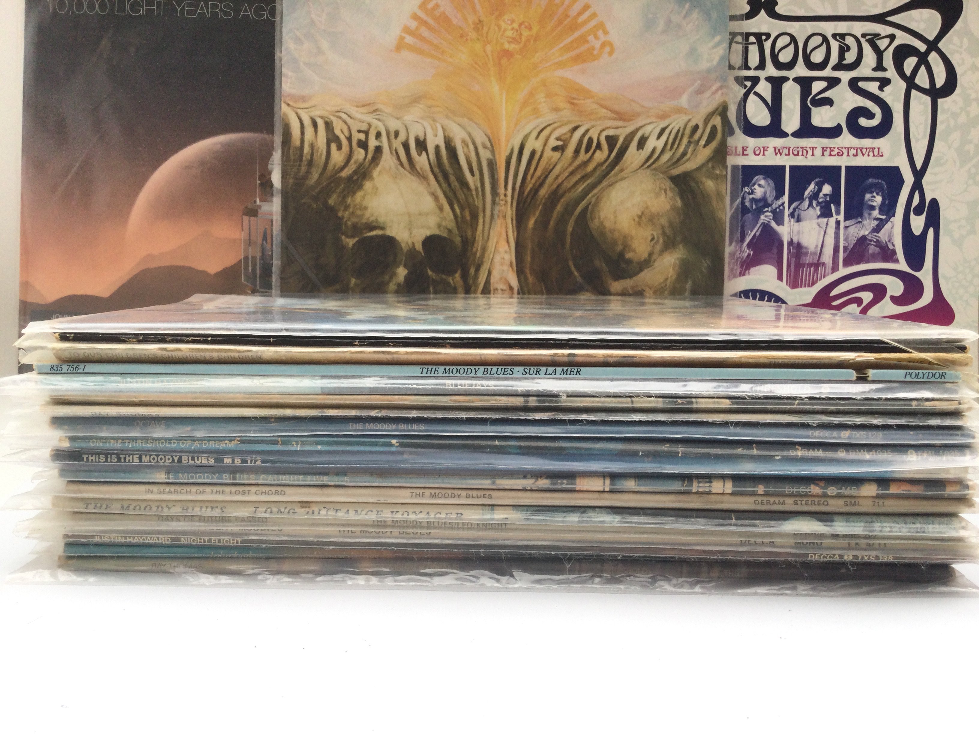 A collection of Moody Blues and related LPs including 180g and original pressings.