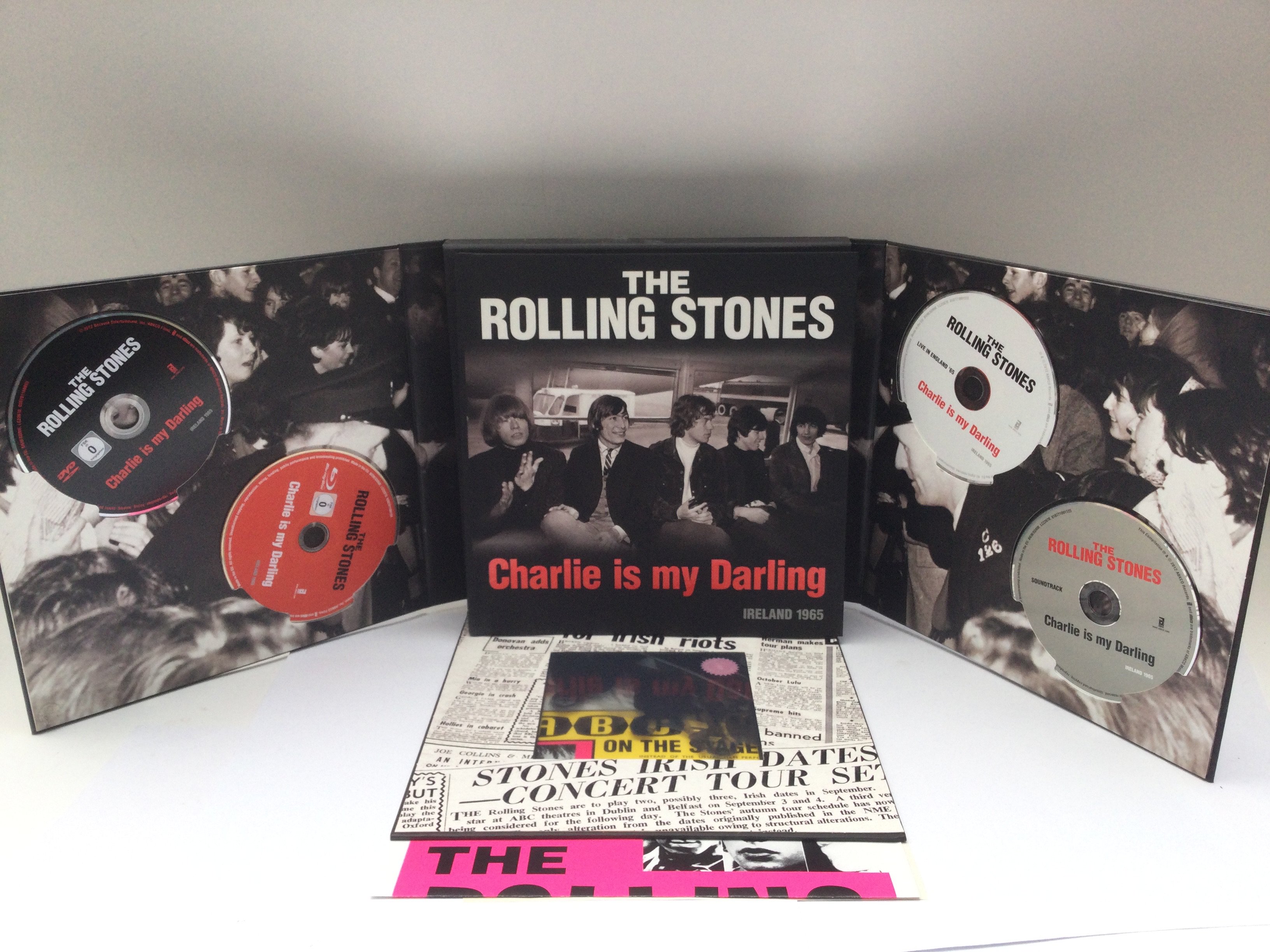 A super deluxe edition Rolling Stones 'Charlie Is My Darling' DVD BluRay box set complete with book and poster.