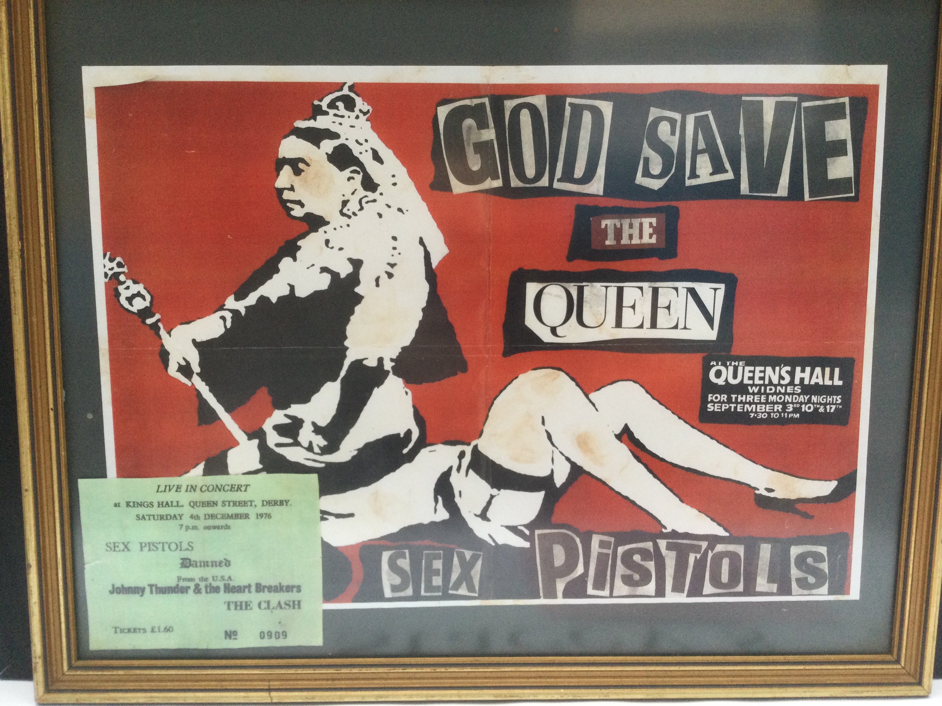 A reproduction Sex Pistols concert ticket for a 1976 tour where most dates were cancelled, a reproduction concert poster plus a framed and glazed display of a Pretty Vacant 7" single and monochrome print of the original line up.