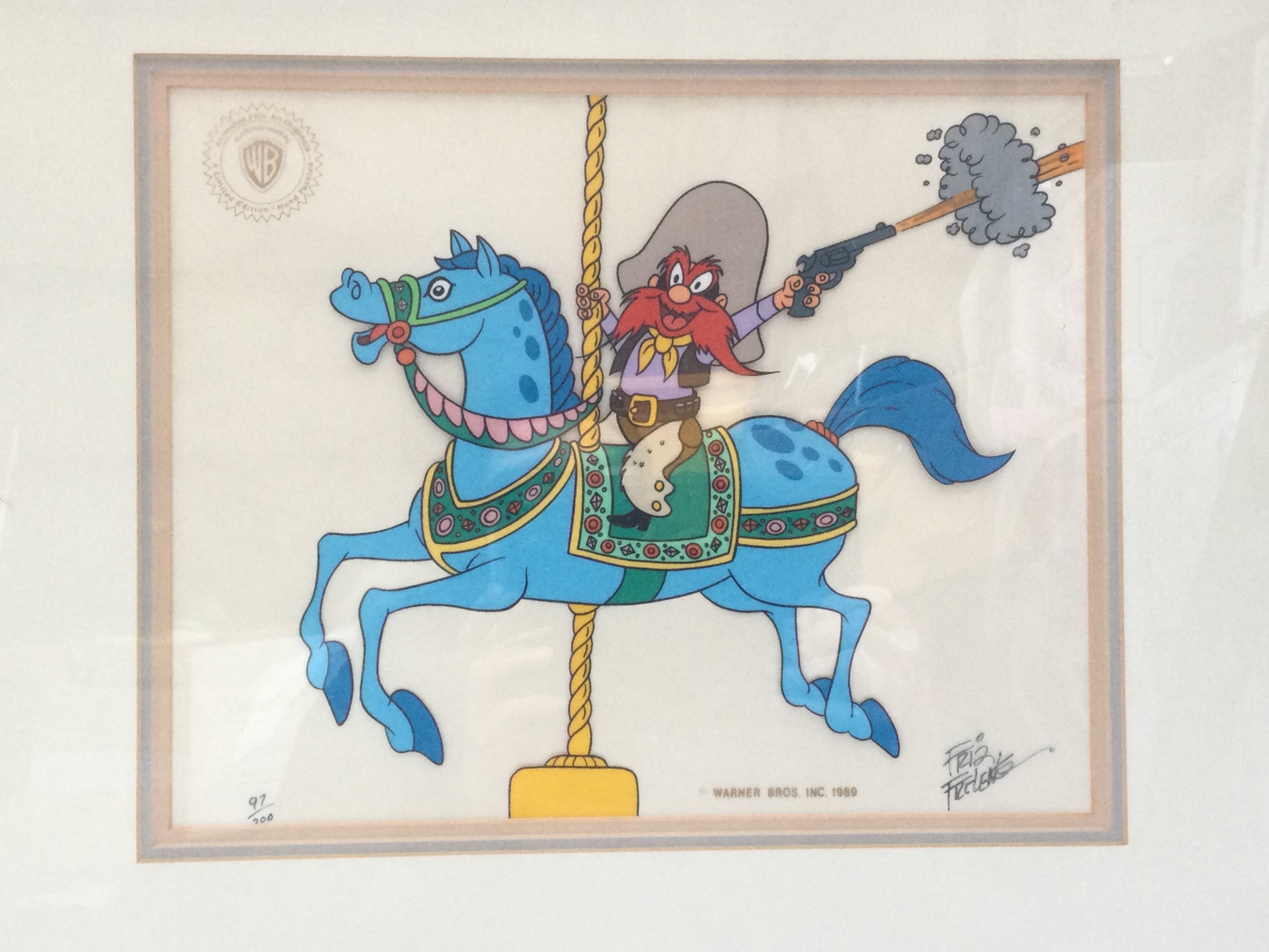 Two framed limited edition Warner Brothers animation serigraph cels, one signed by animator Friz Freleng, both featuring Yosemite Sam. Largest approx 59cm x 52cm including frame.