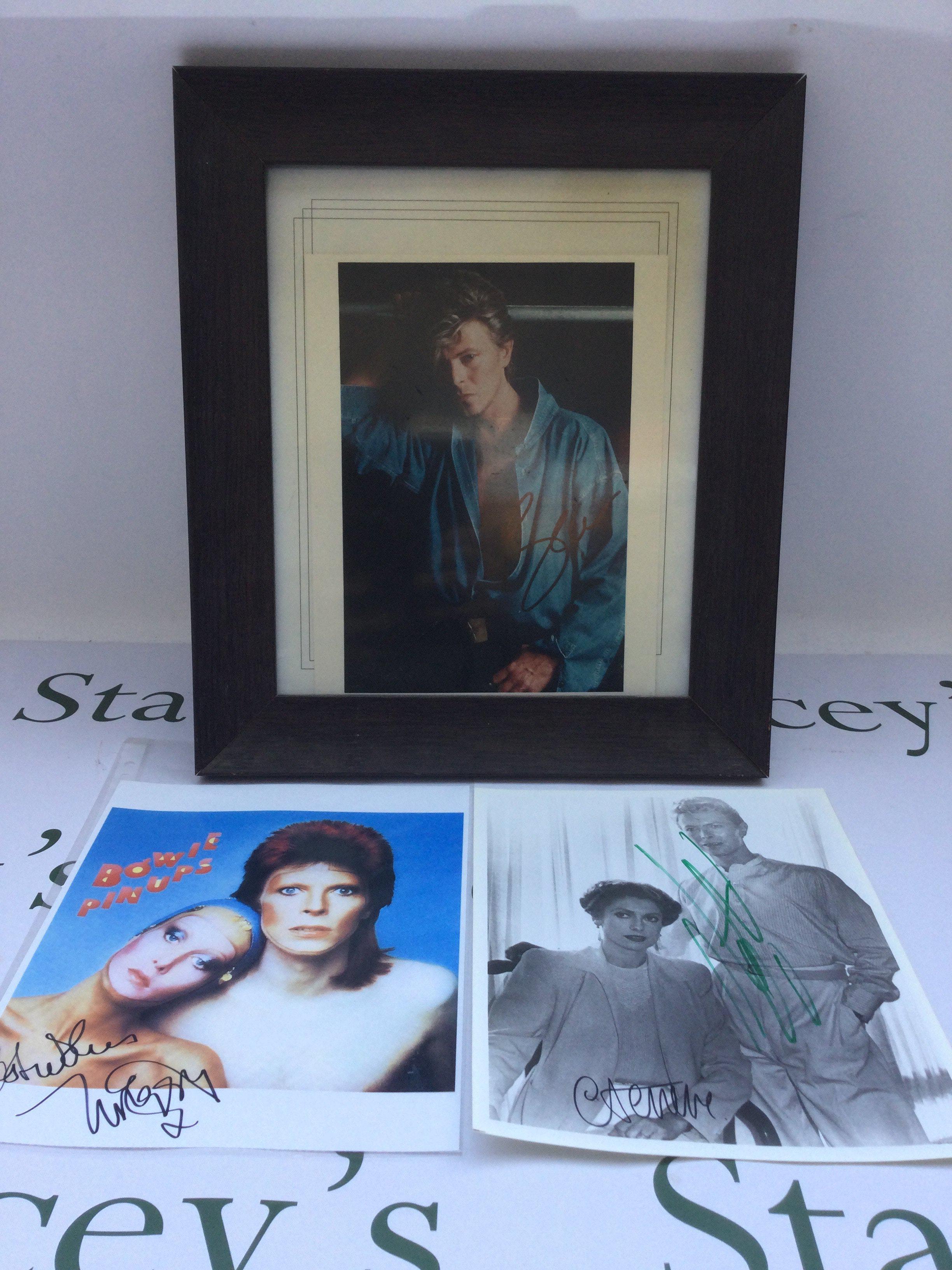 A signed photo of David Bowie plus related signatures including Twiggy, co cover star of the 'Pin Ups' LP.