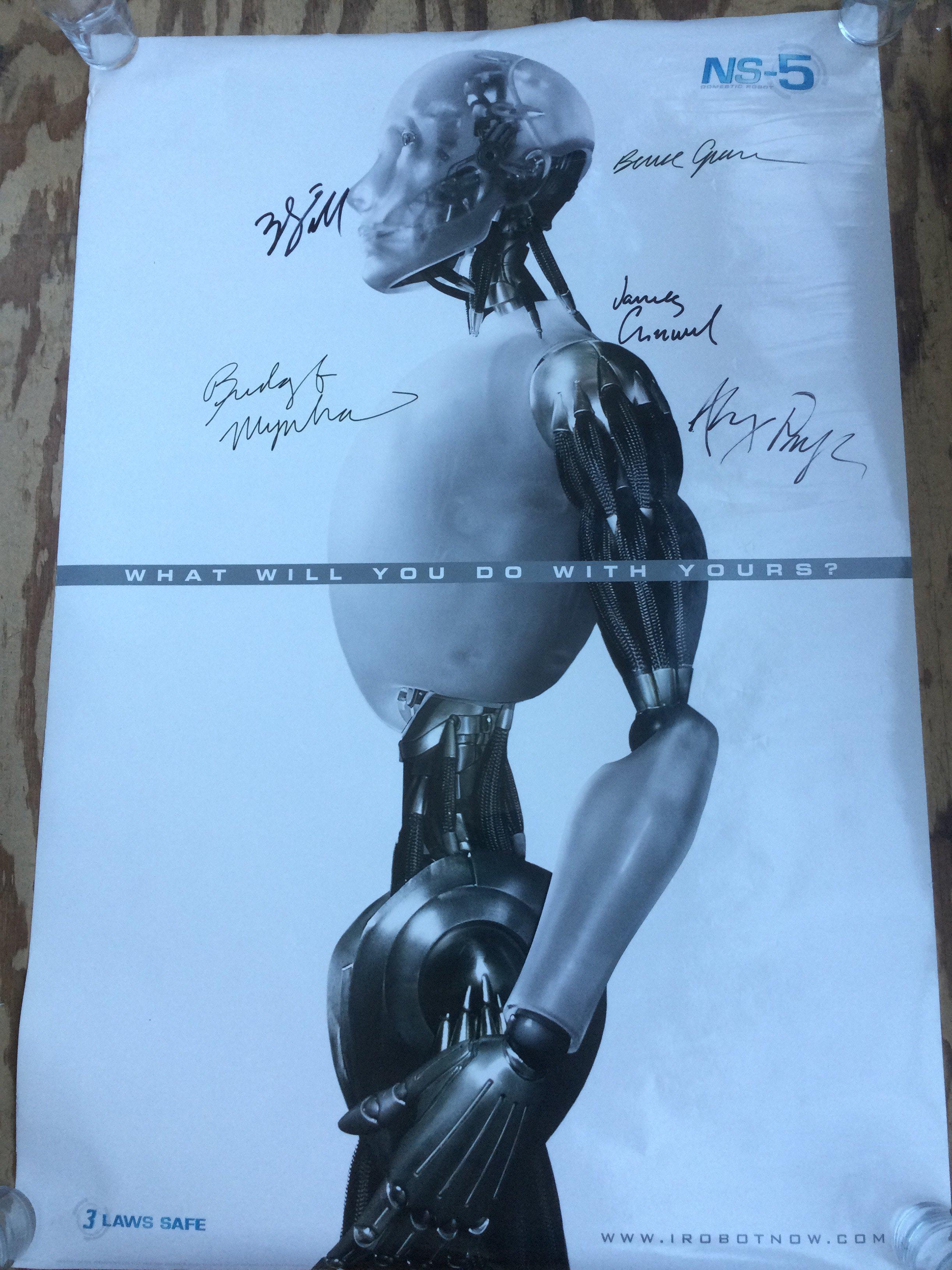 A multi signed rolled film poster for i-Robot, signed by Will Smith, Bridget Moynahan, Bruce Greenwood and other cast members.