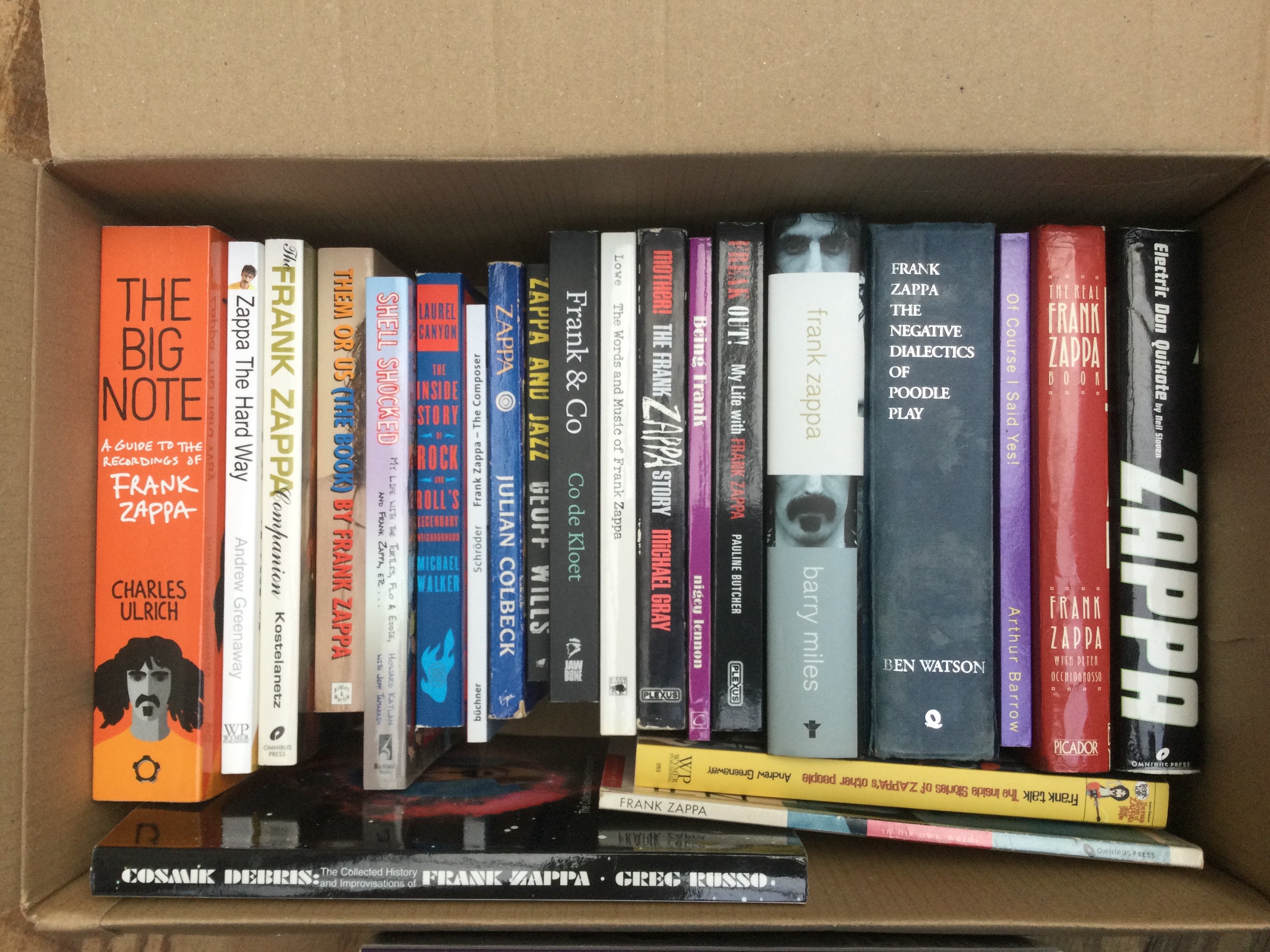 A box of Frank Zappa books.