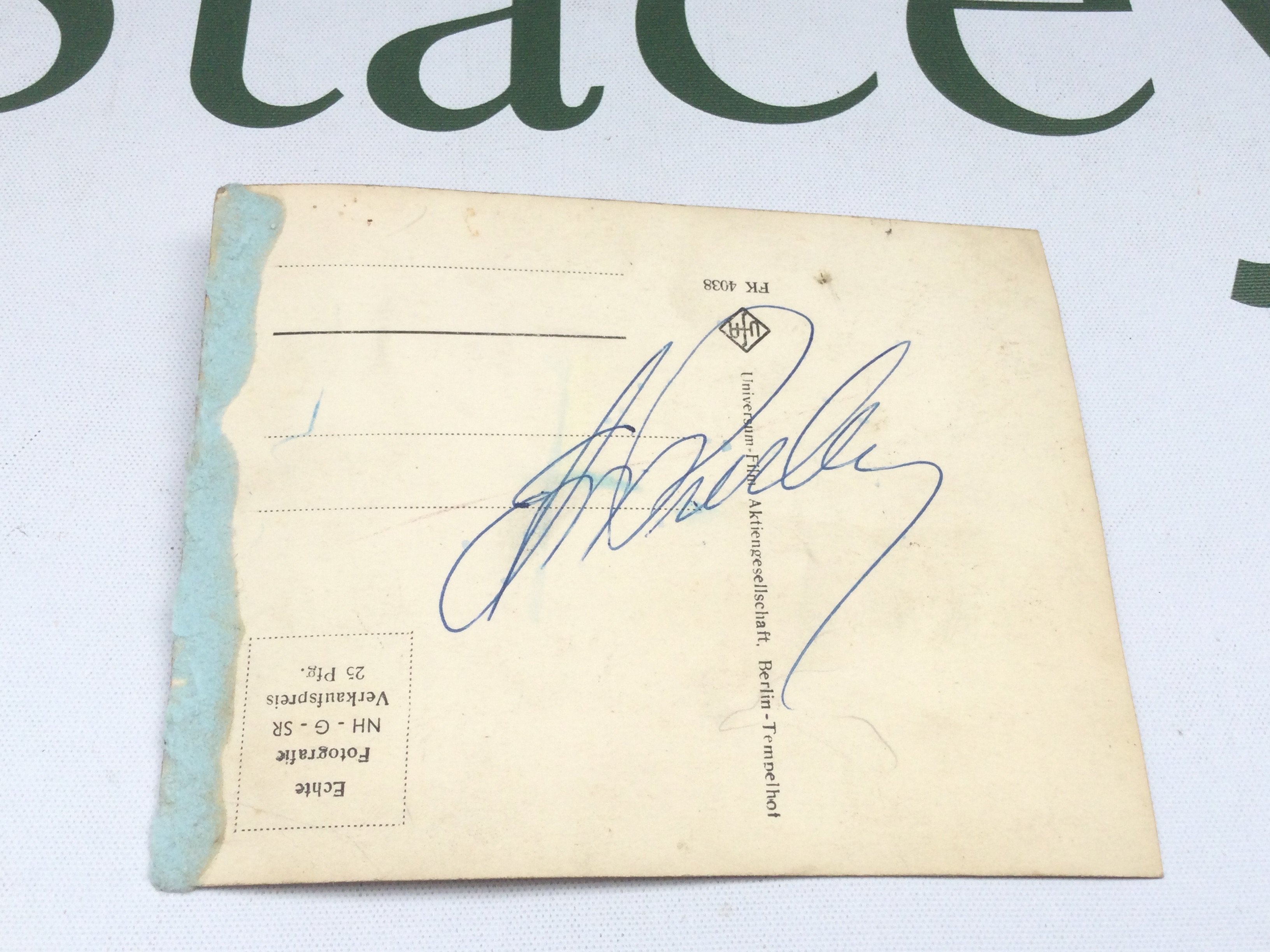 An Elvis Presley signed postcard. From the estate of a wealthy deceased lady who travelled extensively and owned multiple properties. No COA.