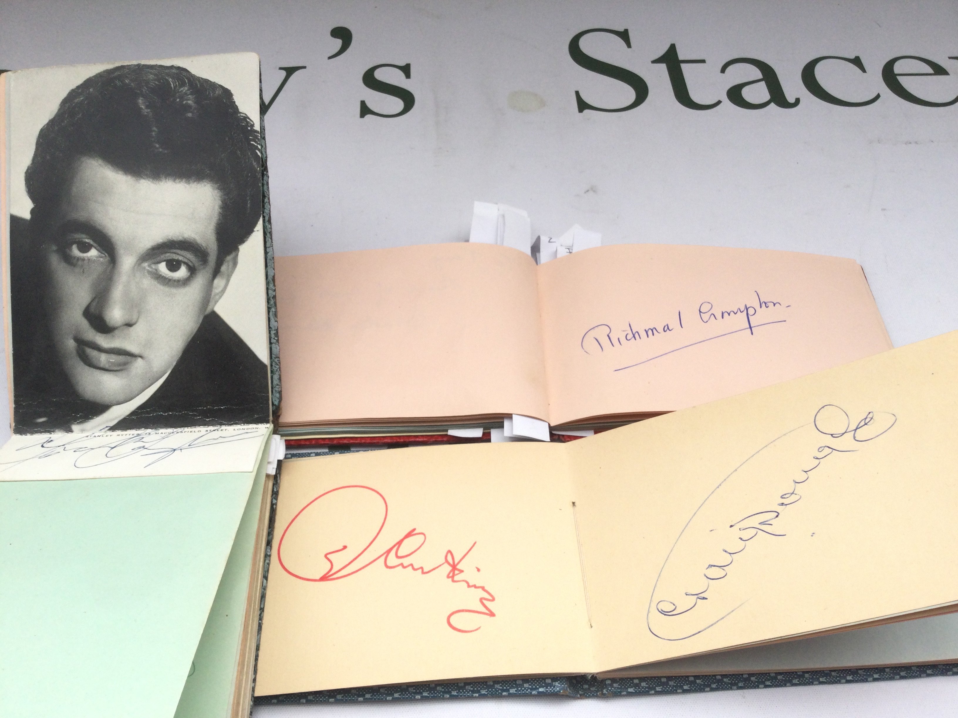 Three autograph booklets containing various names from film, music and sport including Frankie Vaughan, Pete Murray, Tommy Trinder and others.
