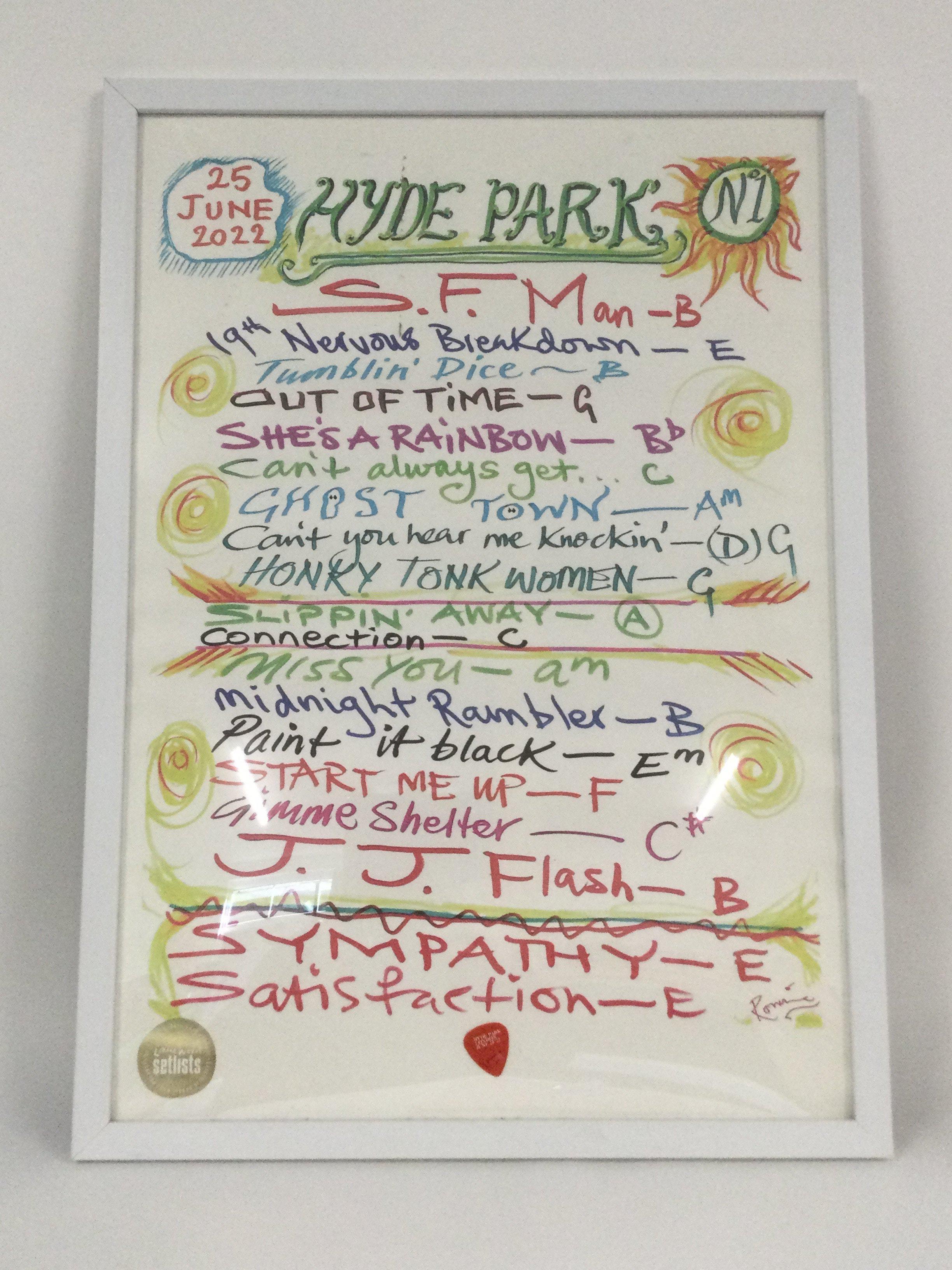A framed and glazed print of a Rolling Stones 2022 set list by Ronnie Wood, approx 45cm x 62cm.