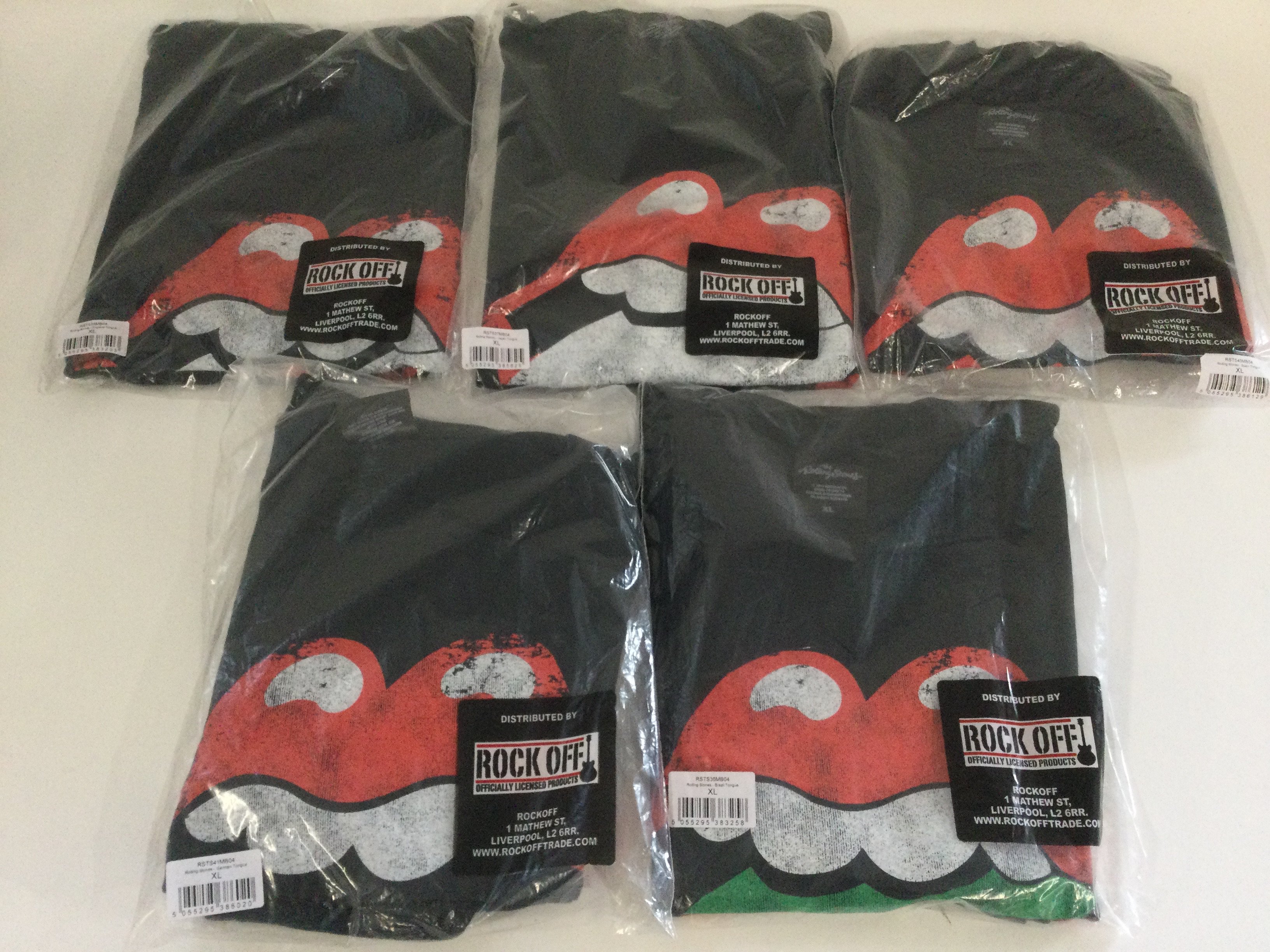 Five Rolling Stones 'Tongue' T shirts from various countries comprising Brazil, Japan, England, Germany and Spain. All size XL.