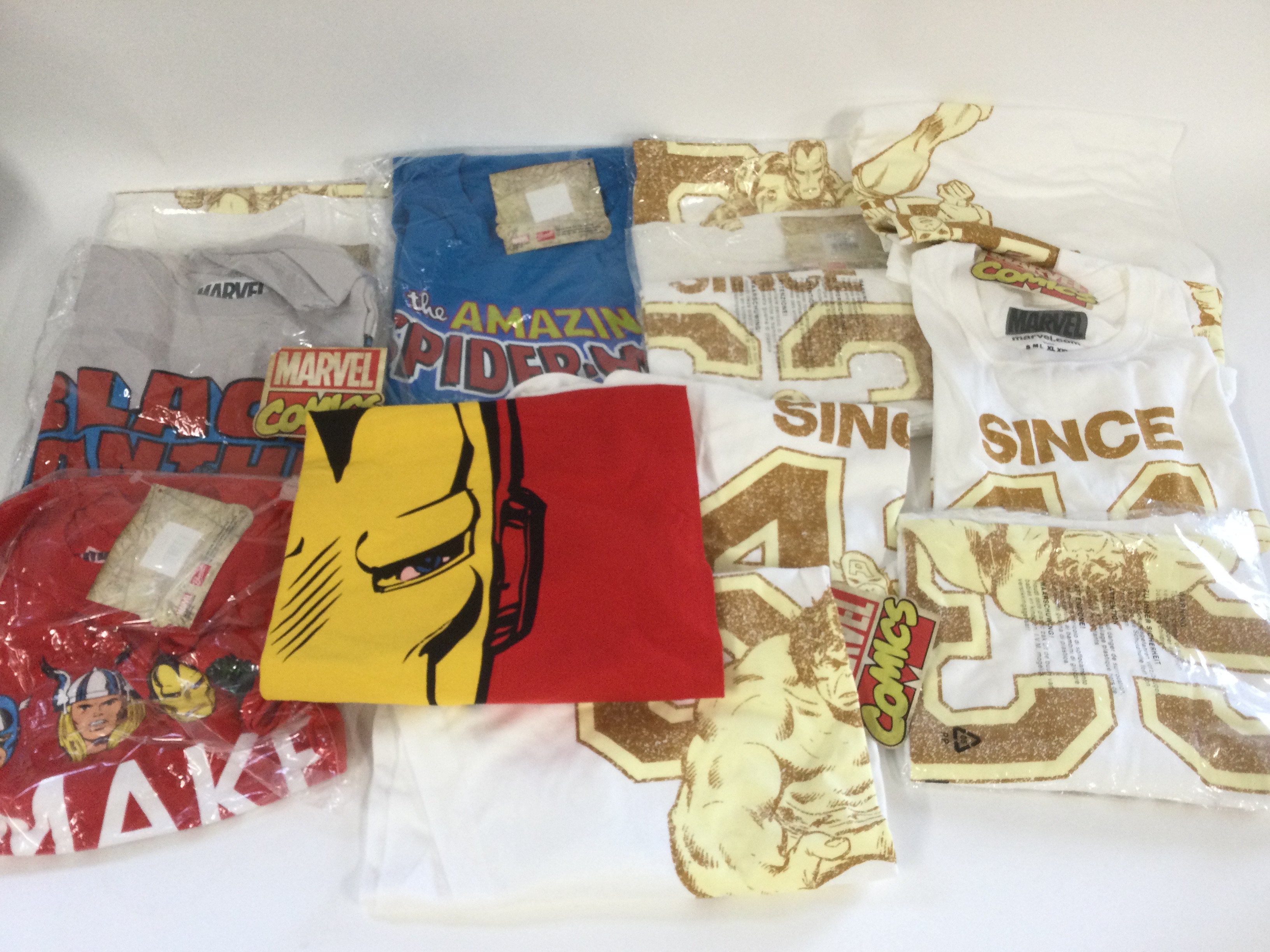 A collection of Marvel comics related T shirts. Various sizes.