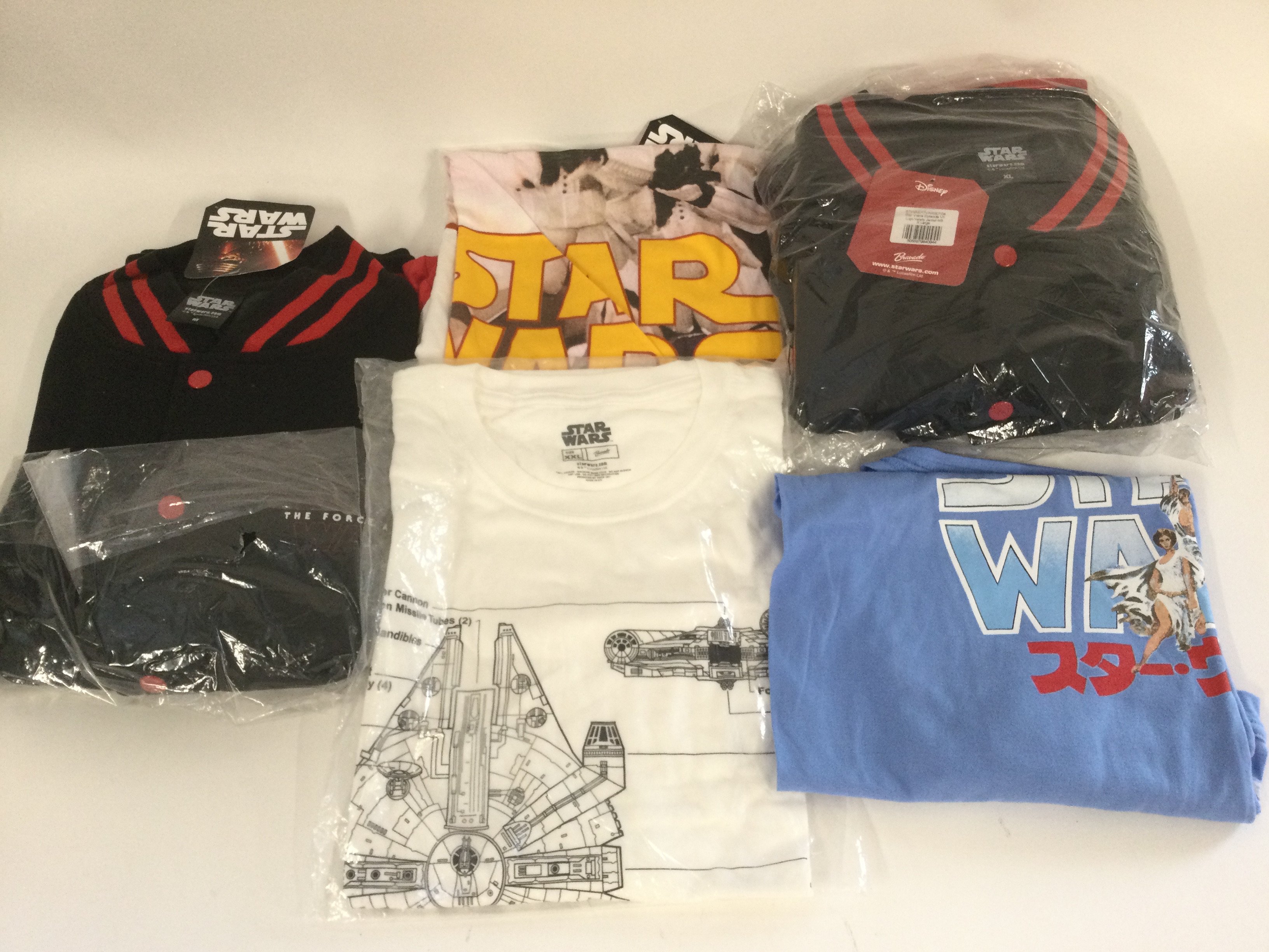 Three Star Wars T shirts and two Varsity jackets, various sizes.
