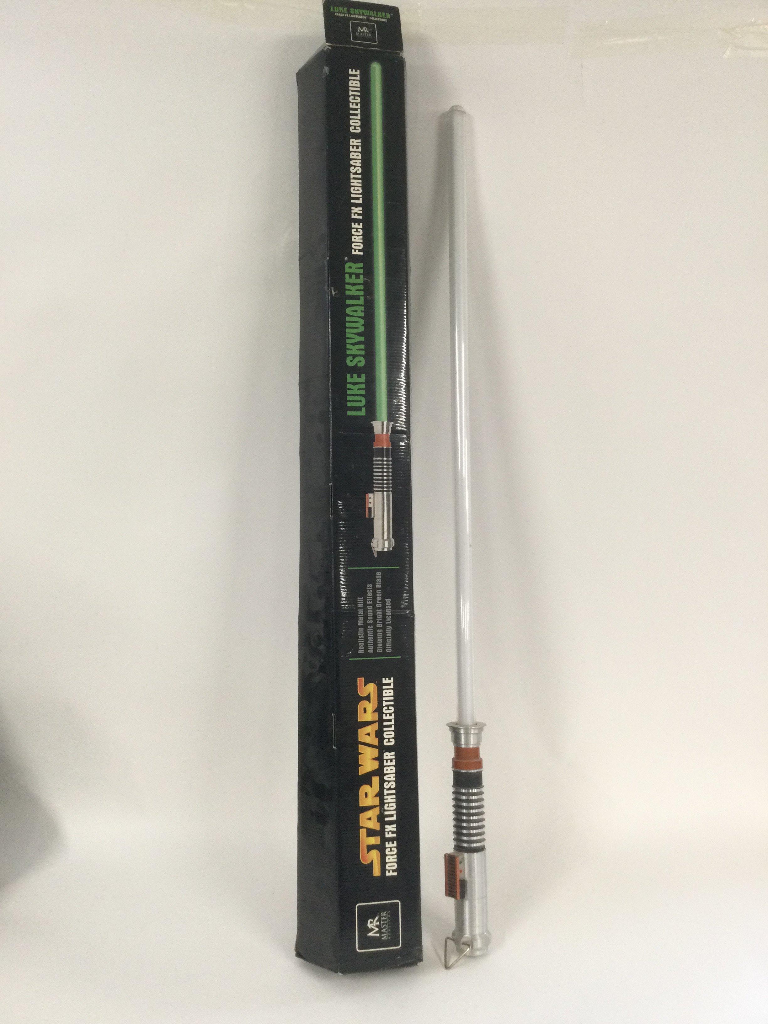 A boxed Master Replicas Star Wars lightsaber, Luke Skywalker model.
