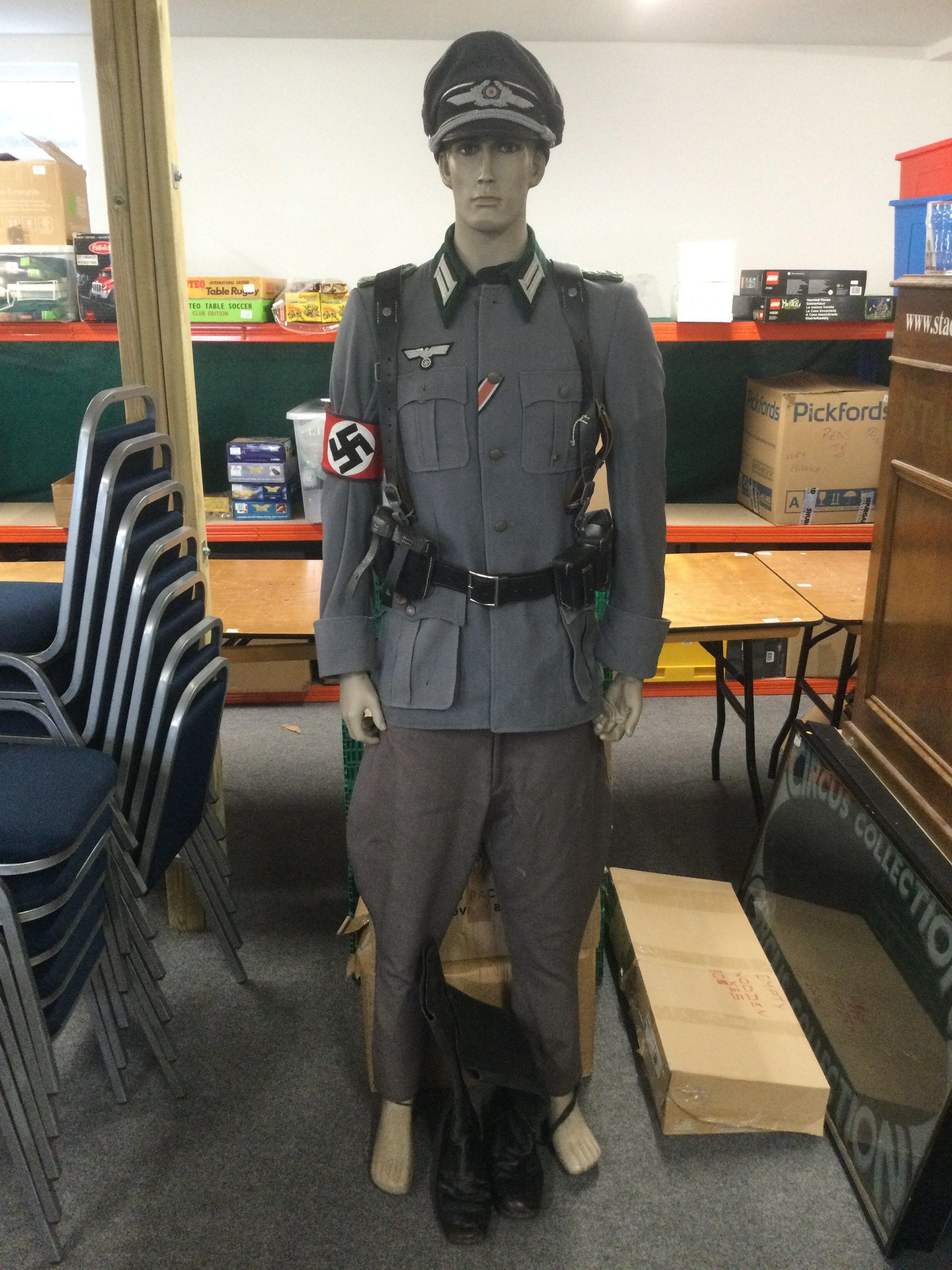 A Western Costume Company film replica of a WW2 German uniform and dummy.