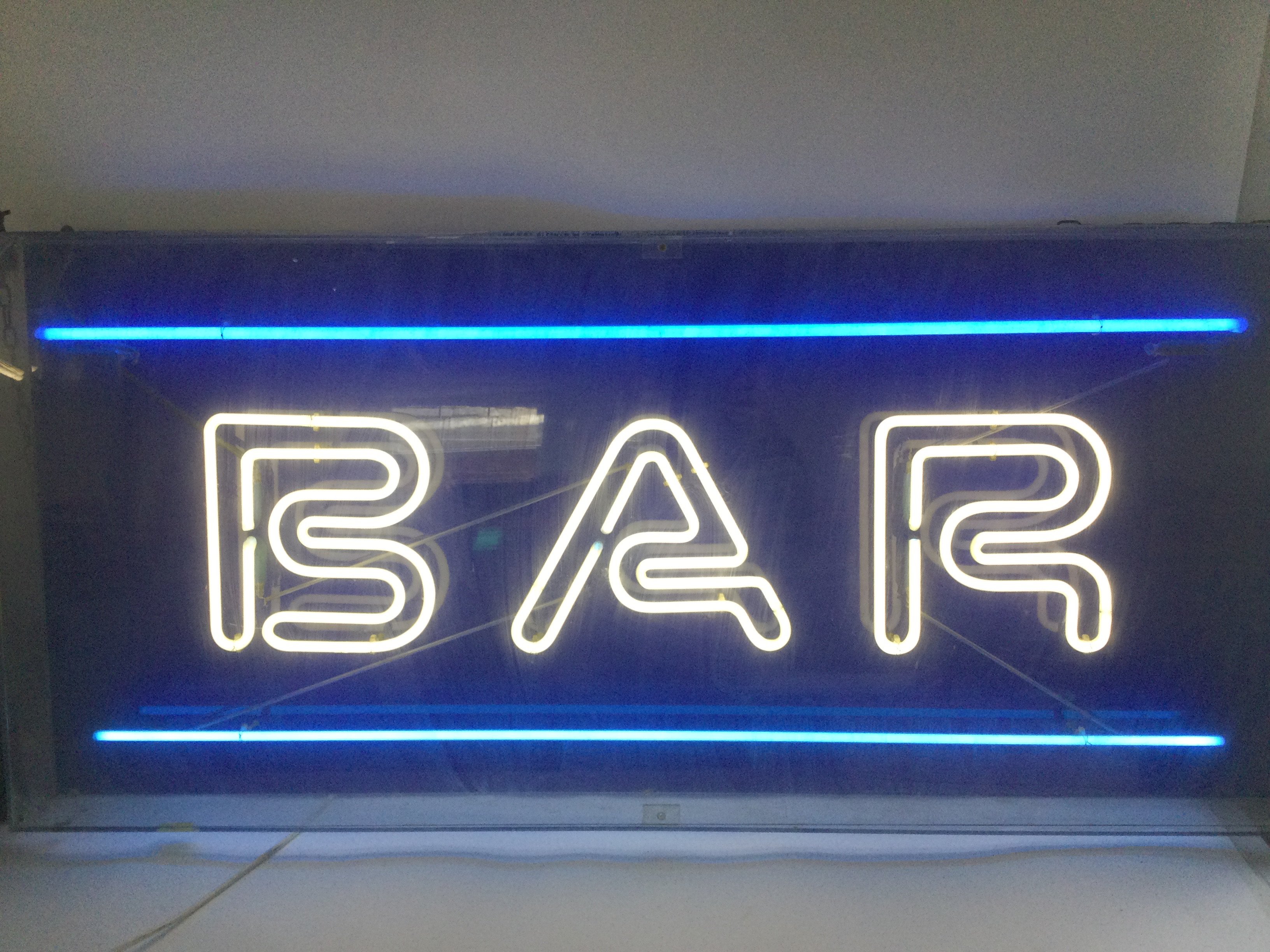 A large neon Bar sign, approx 135cm x 62cm.