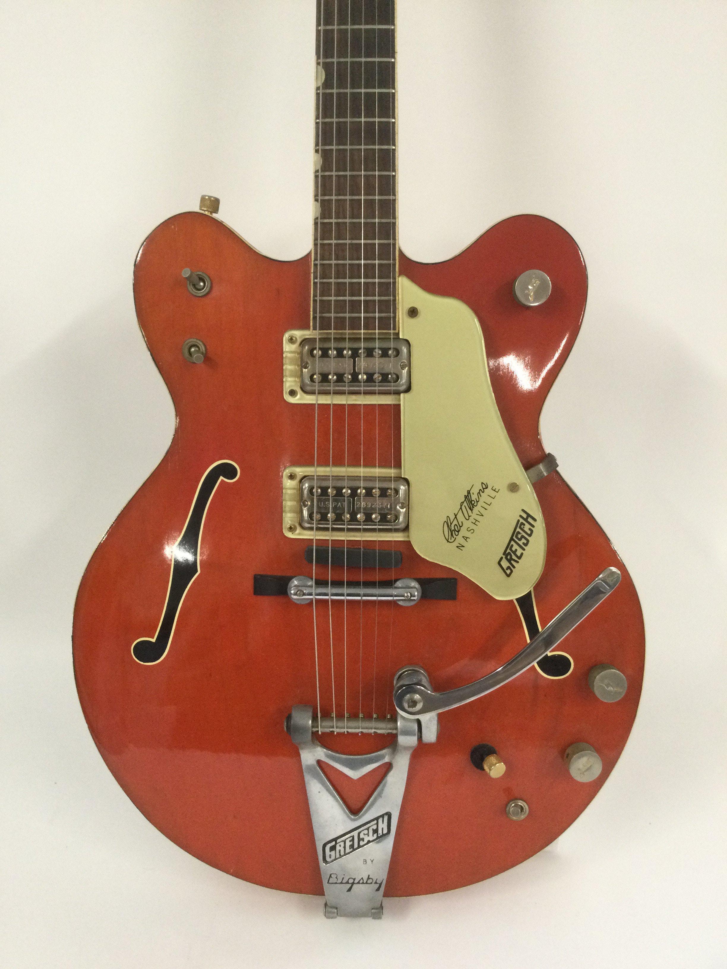 A 1963 Gretsch G6120 Chet Atkins electric guitar in the classic Western Orange finish. Needs repair to the binding in some places. Comes with original Gretsch hard carry case.