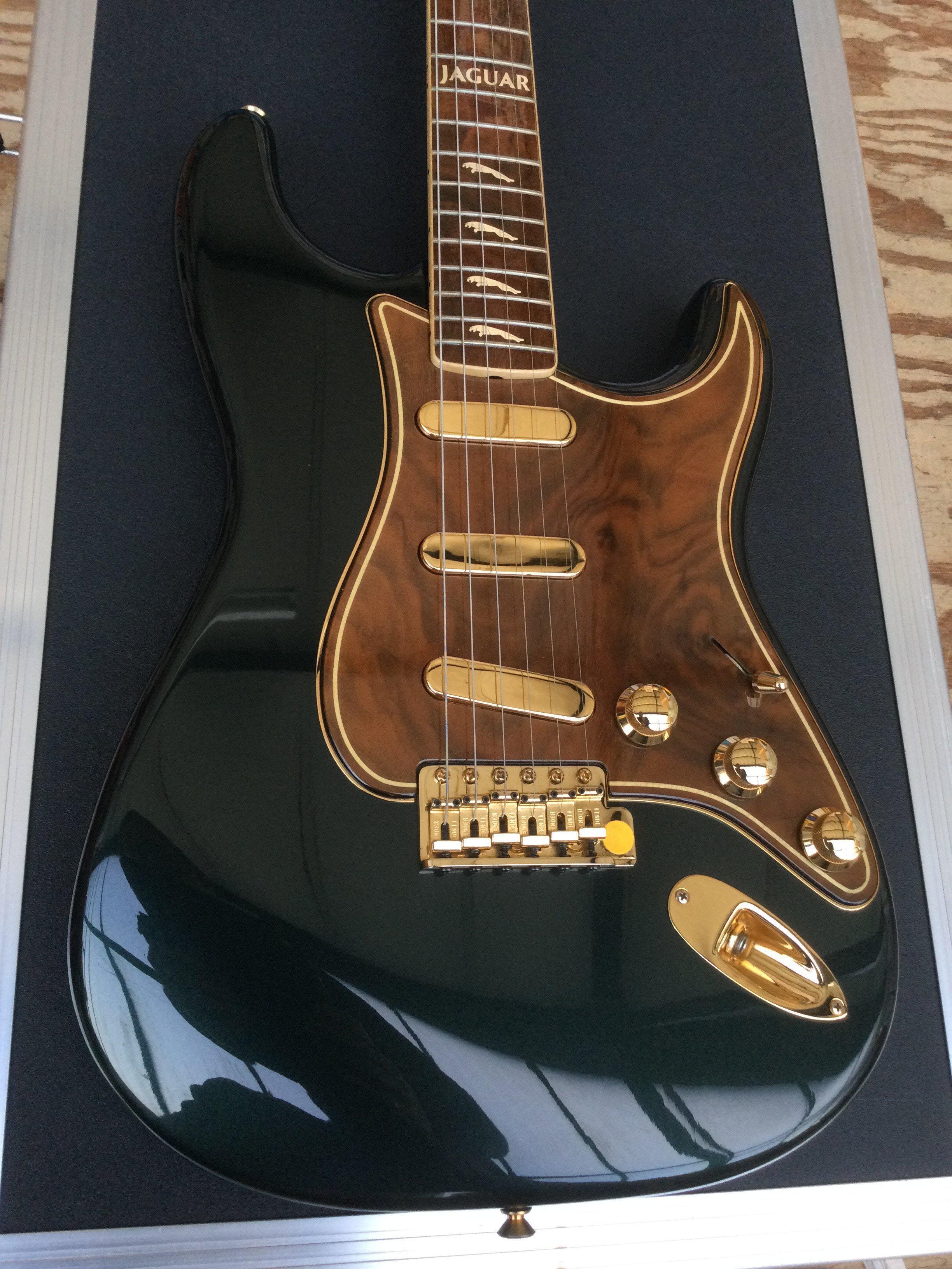 A very rare Fender Custom Jaguar Stratocaster XK-50 in brand new excellent condition. Number 20 of 25. Limited edition by the Fender custom shop in partnership with Jaguar. Only 5 of these guitars made it into the public domain, the other 20 went to Jaguar dealerships. Includes all case candy, protective case and original bag made from the same leather as the car interior. Comes with a limited edition Fender Custom shop hardback book with slipcase.