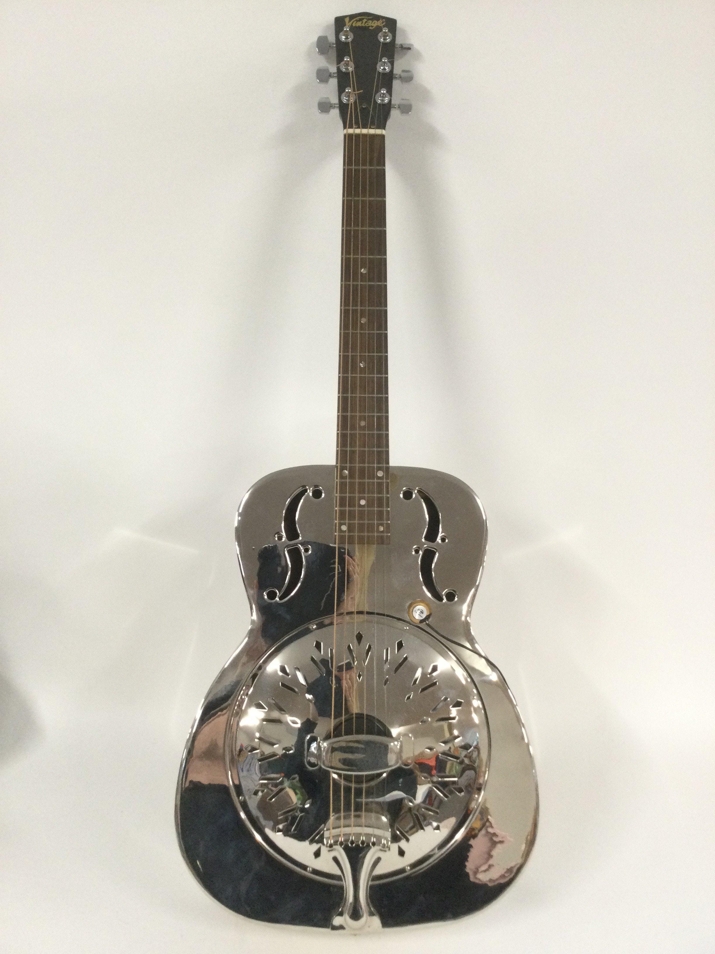 A Vintage resonator guitar fitted with a Soho transducer. Comes supplied with a hard carry case.