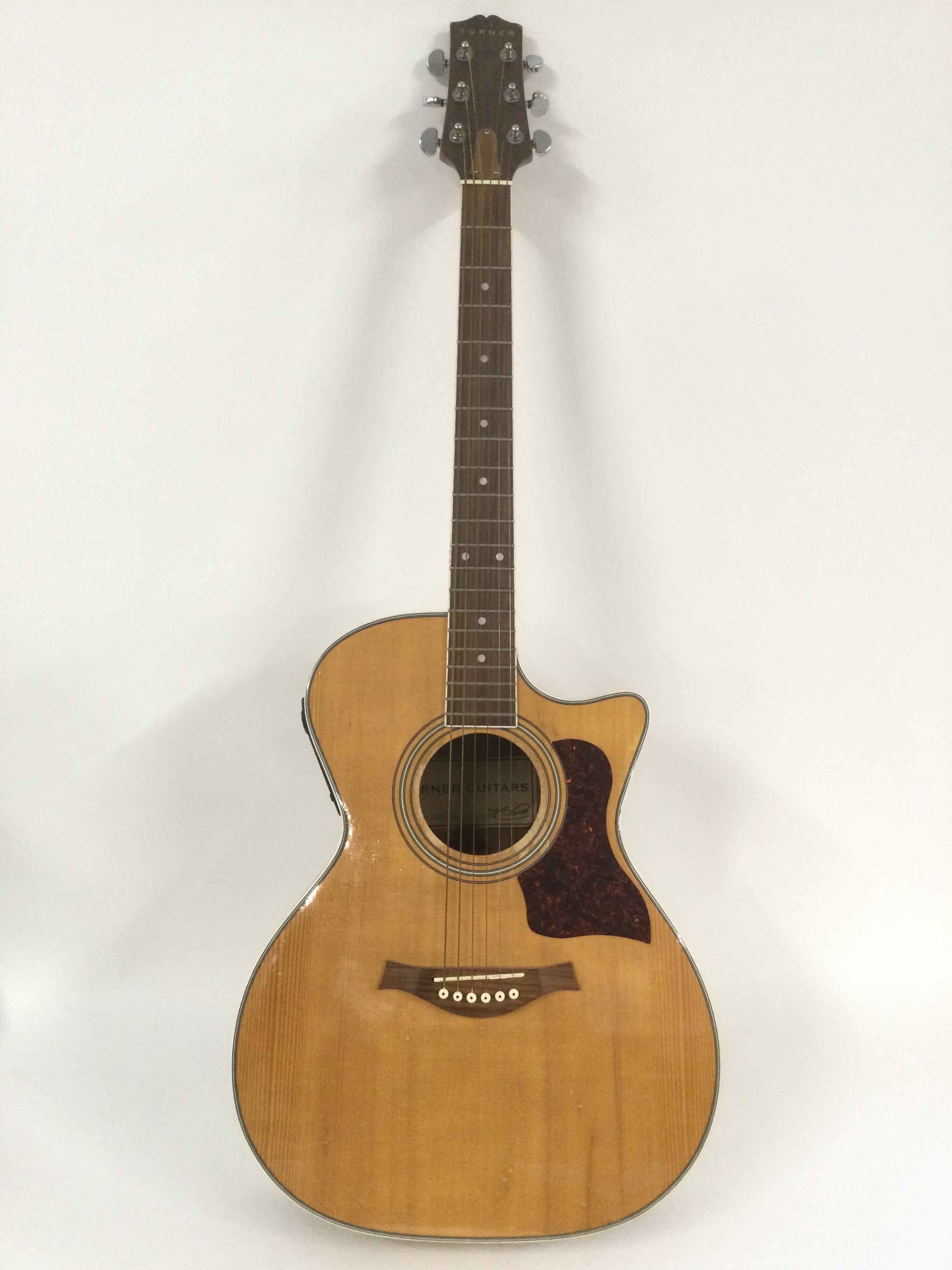 A Turner TG42C electro acoustic guitar, no case.