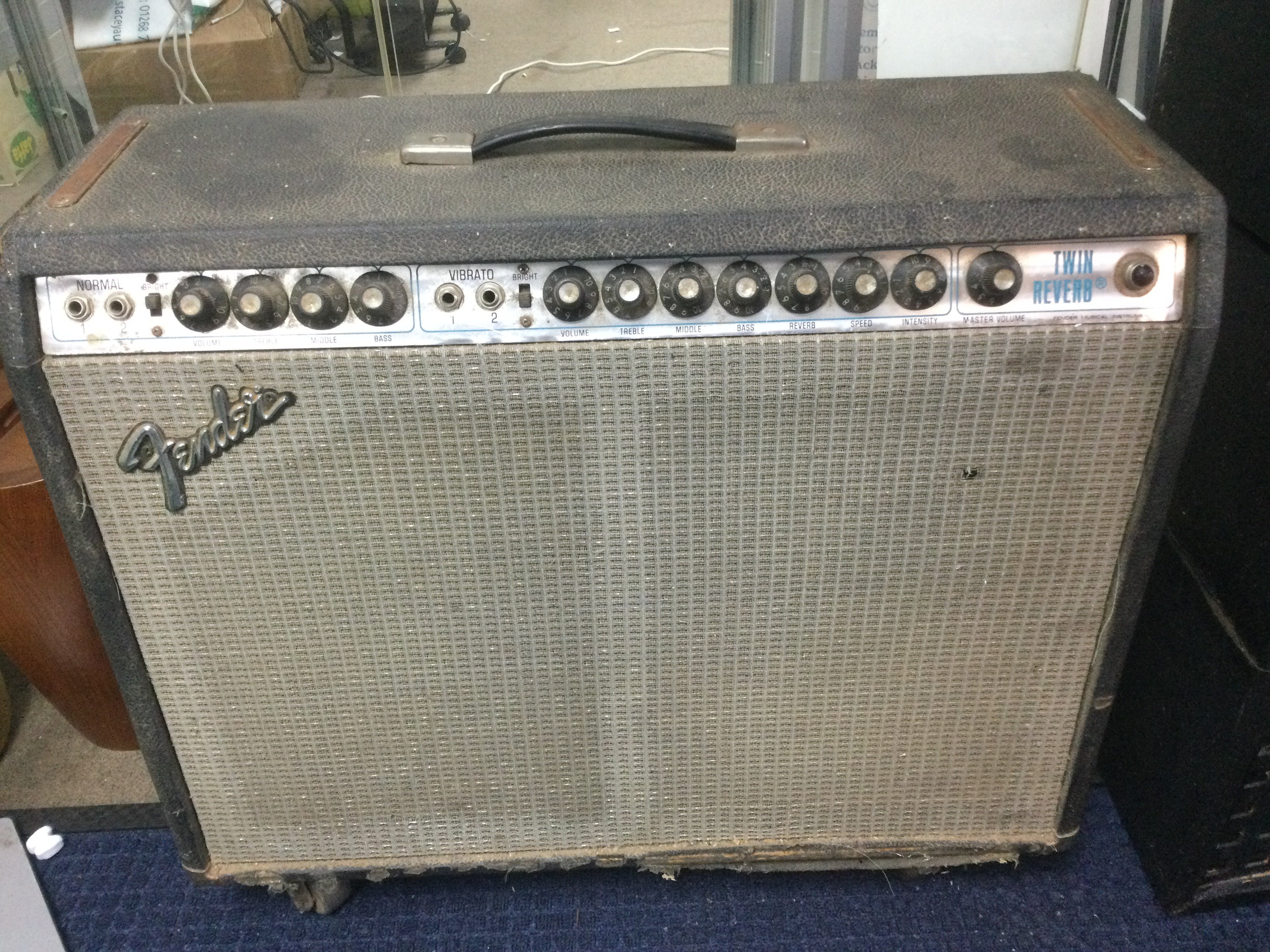 A vintage 'silverface' Fender Twin amplifier. Noisy Master Volume pot. First date number on transformer illegible.