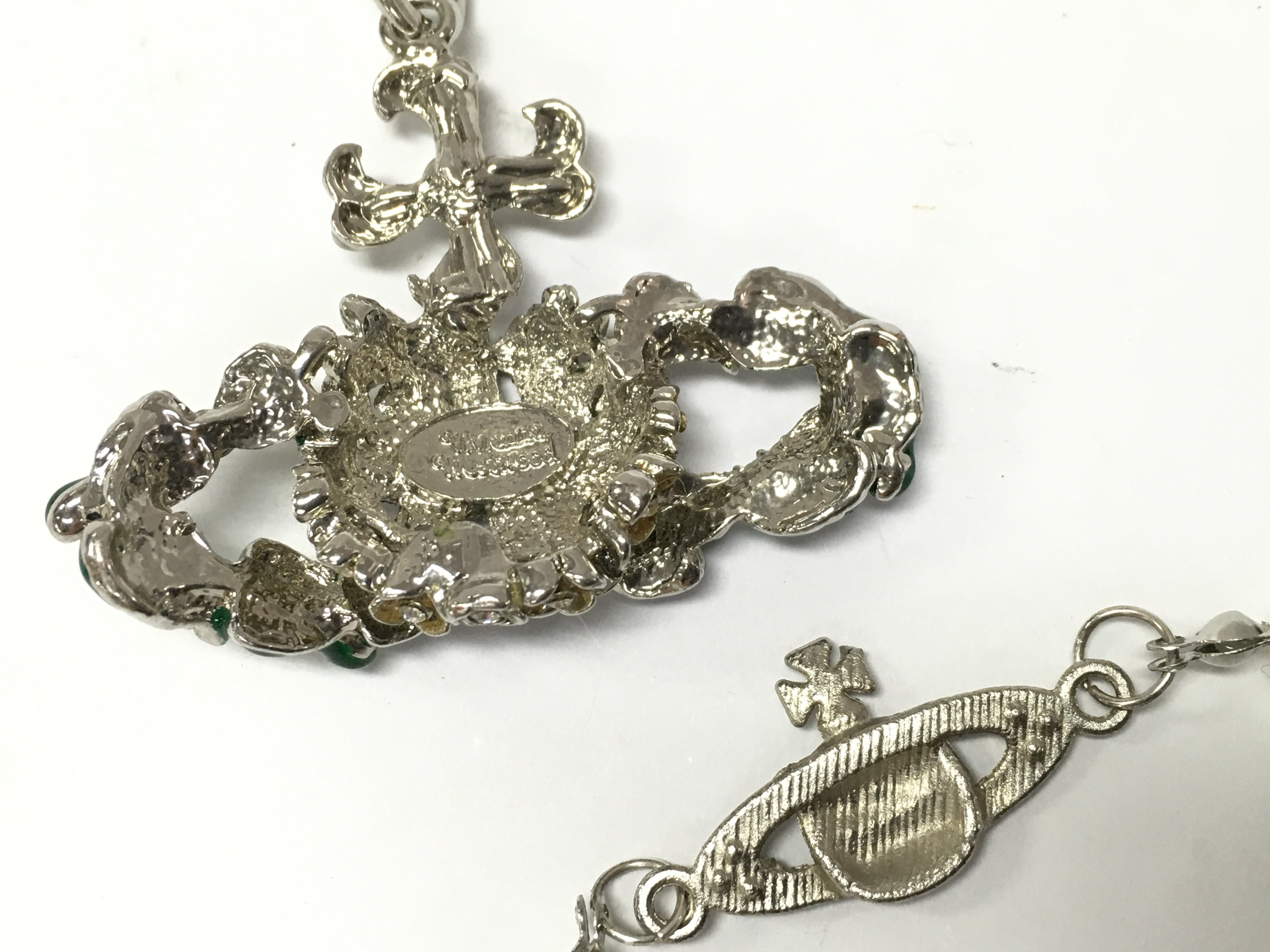 Vivienne Westwood jewellery including a flower orb necklace pendant , postage catA NO RESERVE